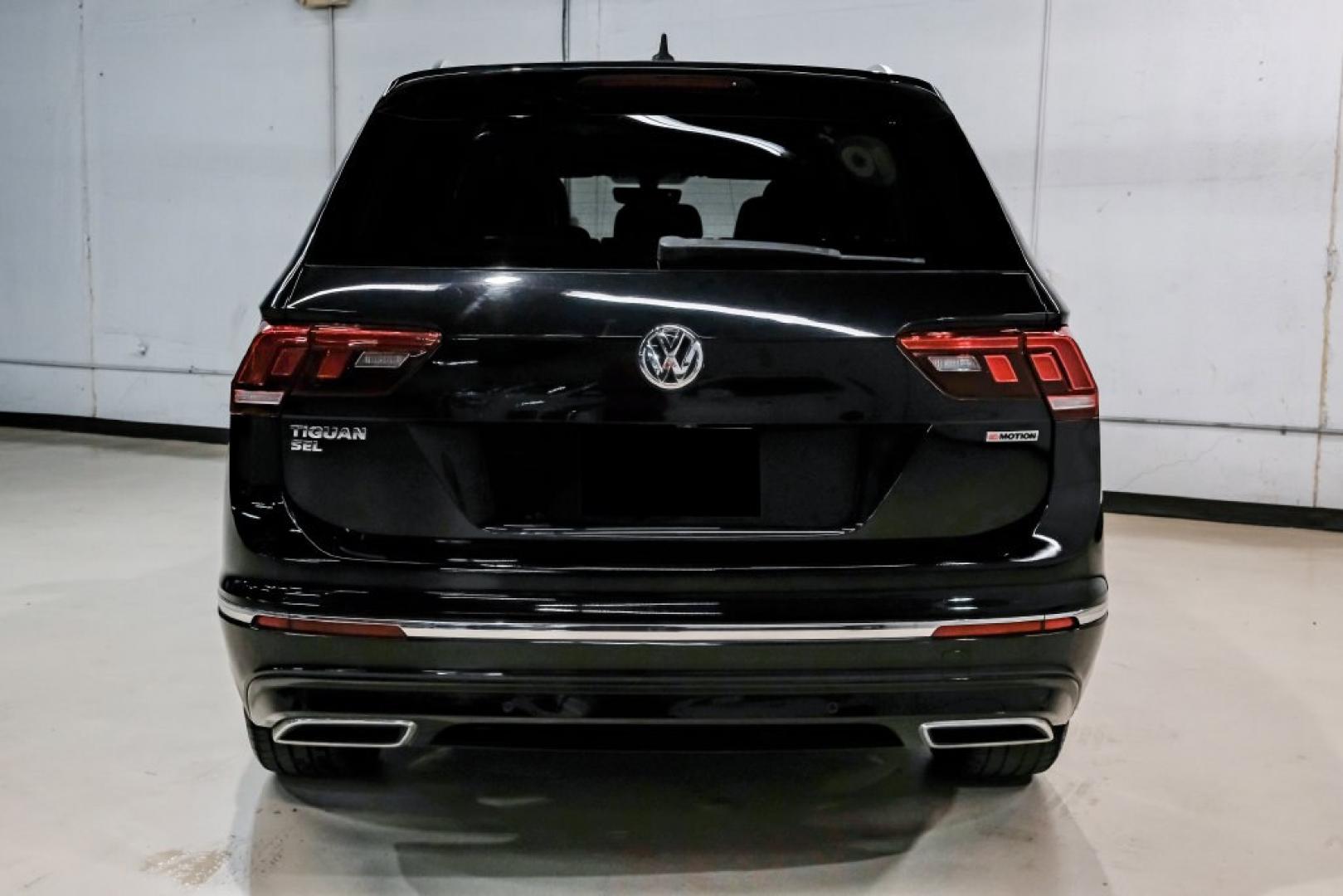 2019 Deep Black /Titan Black Volkswagen Tiguan 2.0T SEL R-Line (3VV2B7AX5KM) with an 2.0L TSI DOHC engine, Automatic transmission, located at 15300 Midway Rd., Addison, TX, 75001, (972) 702-0011, 32.958321, -96.838074- Photo#11