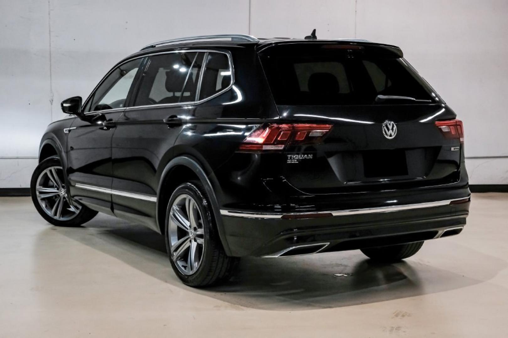 2019 Deep Black /Titan Black Volkswagen Tiguan 2.0T SEL R-Line (3VV2B7AX5KM) with an 2.0L TSI DOHC engine, Automatic transmission, located at 15300 Midway Rd., Addison, TX, 75001, (972) 702-0011, 32.958321, -96.838074- Photo#12