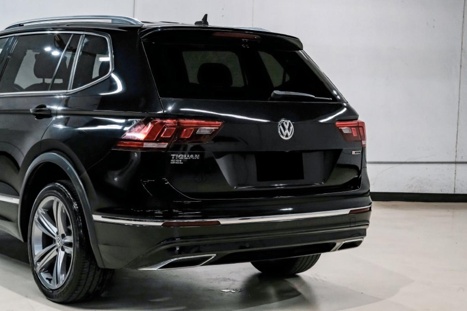 2019 Deep Black /Titan Black Volkswagen Tiguan 2.0T SEL R-Line (3VV2B7AX5KM) with an 2.0L TSI DOHC engine, Automatic transmission, located at 15300 Midway Rd., Addison, TX, 75001, (972) 702-0011, 32.958321, -96.838074- Photo#14