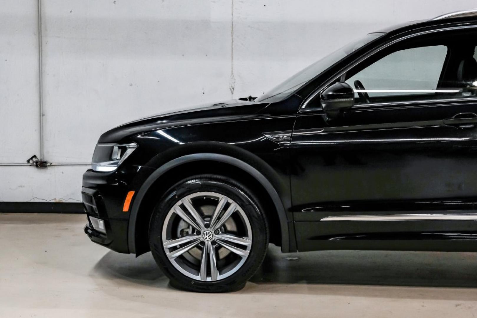2019 Deep Black /Titan Black Volkswagen Tiguan 2.0T SEL R-Line (3VV2B7AX5KM) with an 2.0L TSI DOHC engine, Automatic transmission, located at 15300 Midway Rd., Addison, TX, 75001, (972) 702-0011, 32.958321, -96.838074- Photo#16
