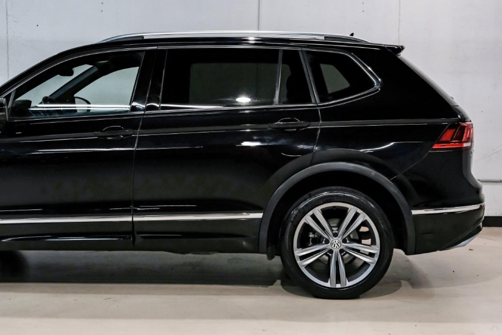 2019 Deep Black /Titan Black Volkswagen Tiguan 2.0T SEL R-Line (3VV2B7AX5KM) with an 2.0L TSI DOHC engine, Automatic transmission, located at 15300 Midway Rd., Addison, TX, 75001, (972) 702-0011, 32.958321, -96.838074- Photo#17