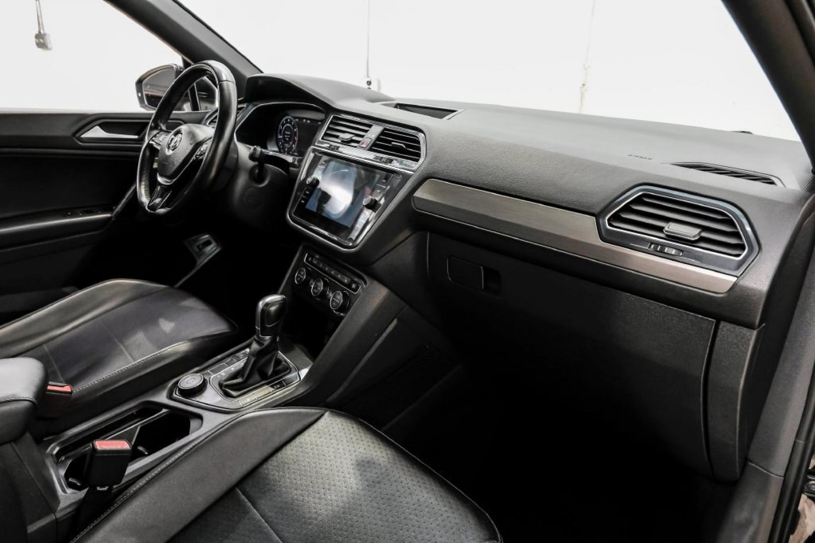 2019 Deep Black /Titan Black Volkswagen Tiguan 2.0T SEL R-Line (3VV2B7AX5KM) with an 2.0L TSI DOHC engine, Automatic transmission, located at 15300 Midway Rd., Addison, TX, 75001, (972) 702-0011, 32.958321, -96.838074- Photo#18
