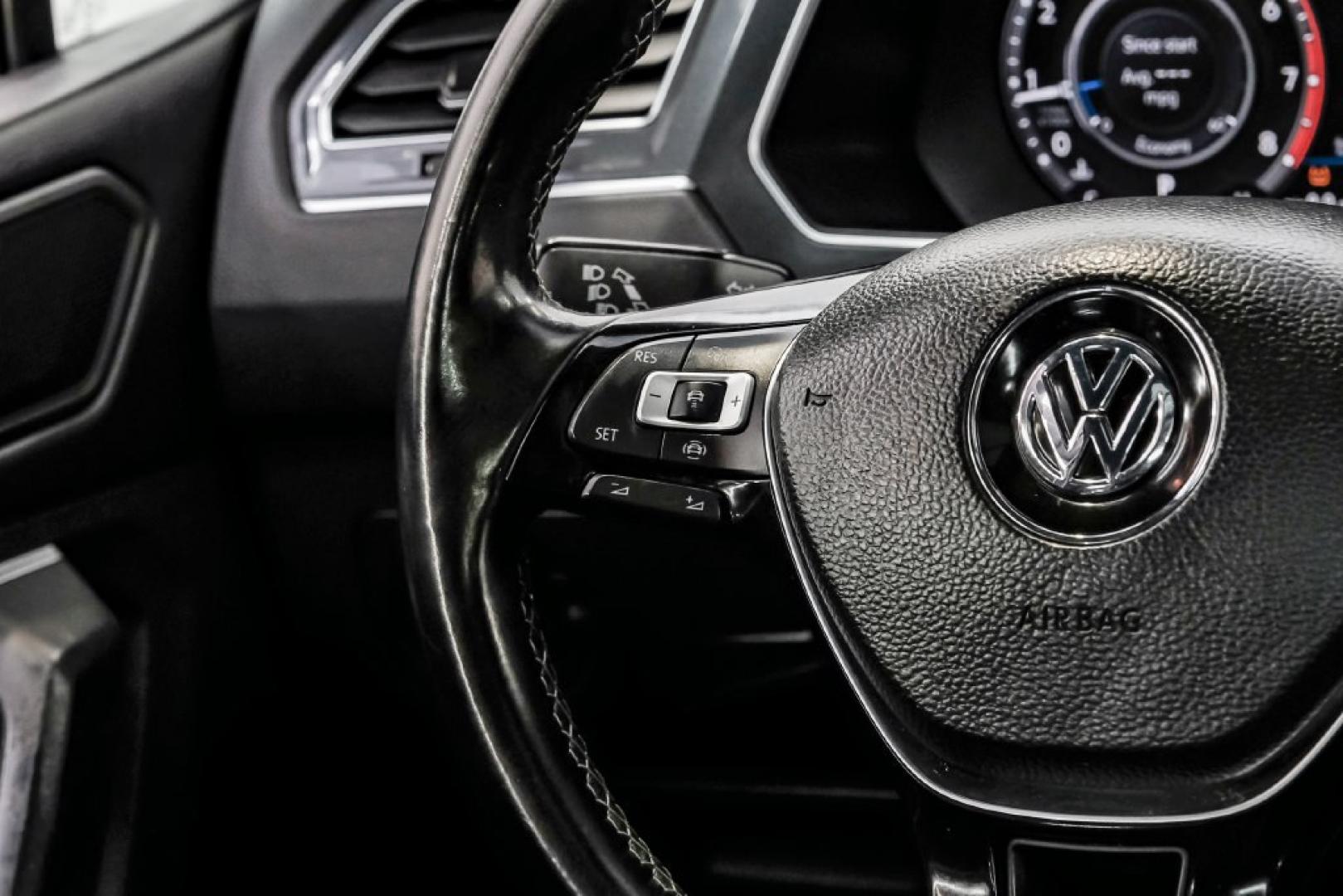 2019 Deep Black /Titan Black Volkswagen Tiguan 2.0T SEL R-Line (3VV2B7AX5KM) with an 2.0L TSI DOHC engine, Automatic transmission, located at 15300 Midway Rd., Addison, TX, 75001, (972) 702-0011, 32.958321, -96.838074- Photo#22