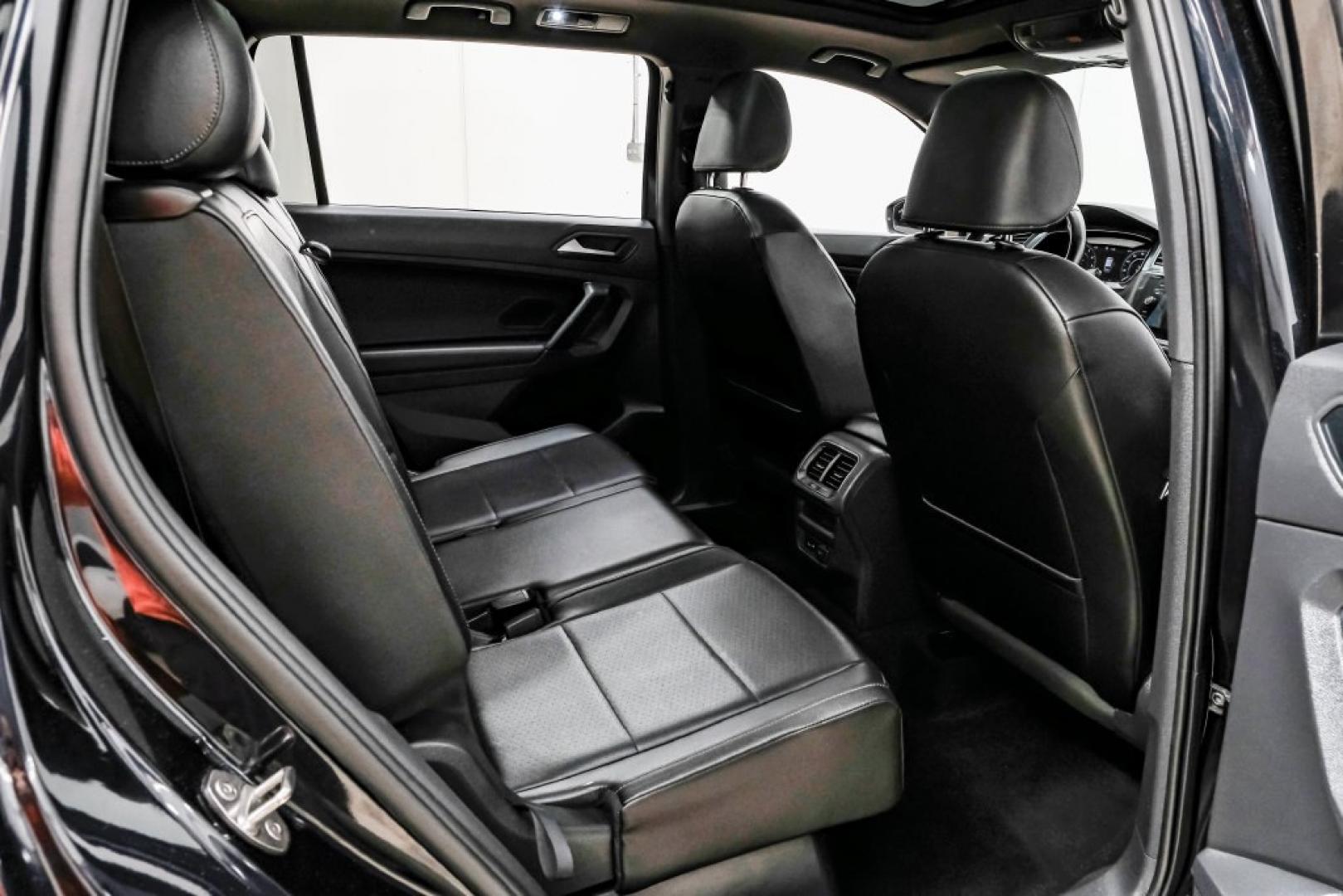 2019 Deep Black /Titan Black Volkswagen Tiguan 2.0T SEL R-Line (3VV2B7AX5KM) with an 2.0L TSI DOHC engine, Automatic transmission, located at 15300 Midway Rd., Addison, TX, 75001, (972) 702-0011, 32.958321, -96.838074- Photo#42
