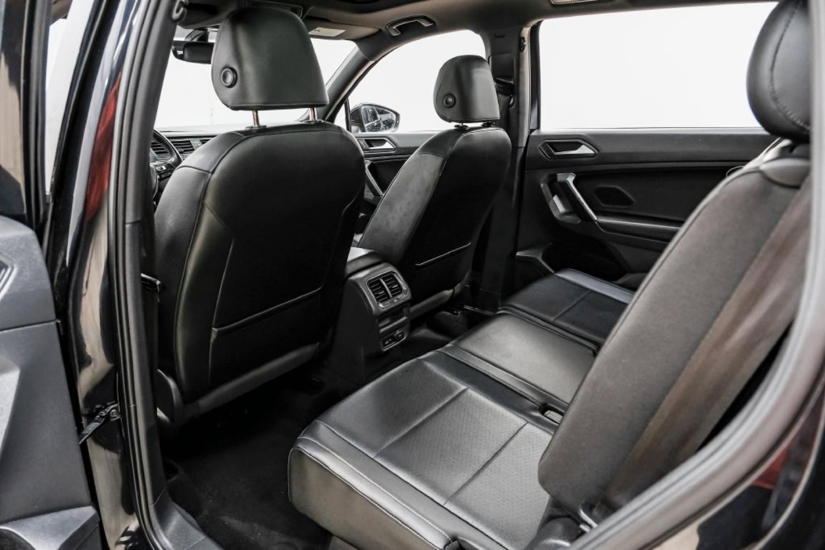 2019 Deep Black /Titan Black Volkswagen Tiguan 2.0T SEL R-Line (3VV2B7AX5KM) with an 2.0L TSI DOHC engine, Automatic transmission, located at 15300 Midway Rd., Addison, TX, 75001, (972) 702-0011, 32.958321, -96.838074- Photo#44