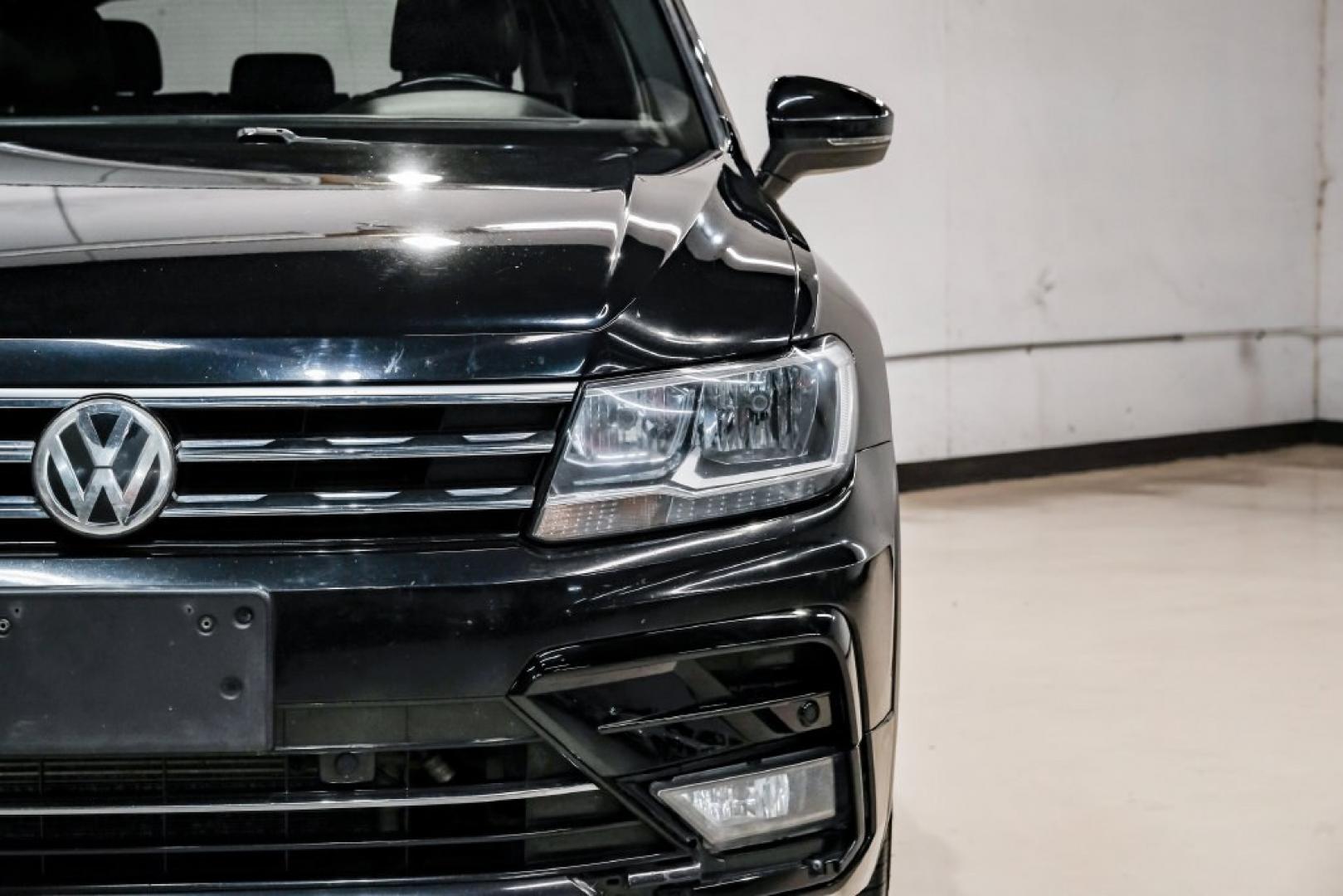 2019 Deep Black /Titan Black Volkswagen Tiguan 2.0T SEL R-Line (3VV2B7AX5KM) with an 2.0L TSI DOHC engine, Automatic transmission, located at 15300 Midway Rd., Addison, TX, 75001, (972) 702-0011, 32.958321, -96.838074- Photo#54