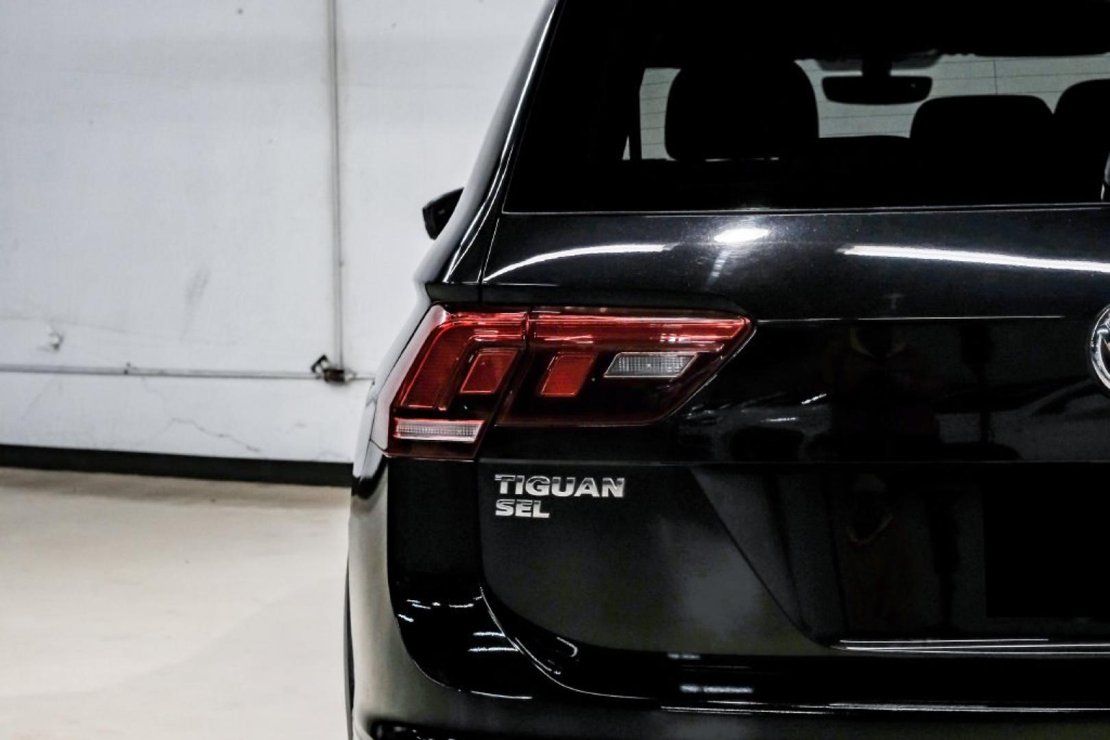 2019 Deep Black /Titan Black Volkswagen Tiguan 2.0T SEL R-Line (3VV2B7AX5KM) with an 2.0L TSI DOHC engine, Automatic transmission, located at 15300 Midway Rd., Addison, TX, 75001, (972) 702-0011, 32.958321, -96.838074- Photo#55
