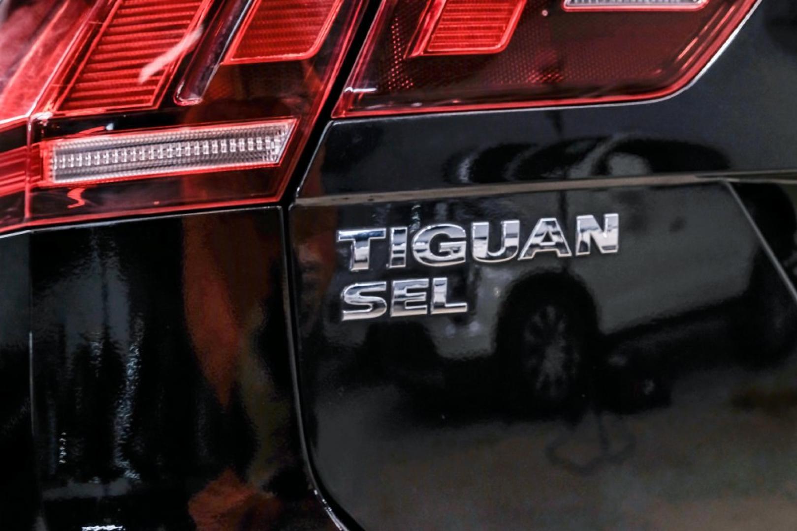 2019 Deep Black /Titan Black Volkswagen Tiguan 2.0T SEL R-Line (3VV2B7AX5KM) with an 2.0L TSI DOHC engine, Automatic transmission, located at 15300 Midway Rd., Addison, TX, 75001, (972) 702-0011, 32.958321, -96.838074- Photo#57
