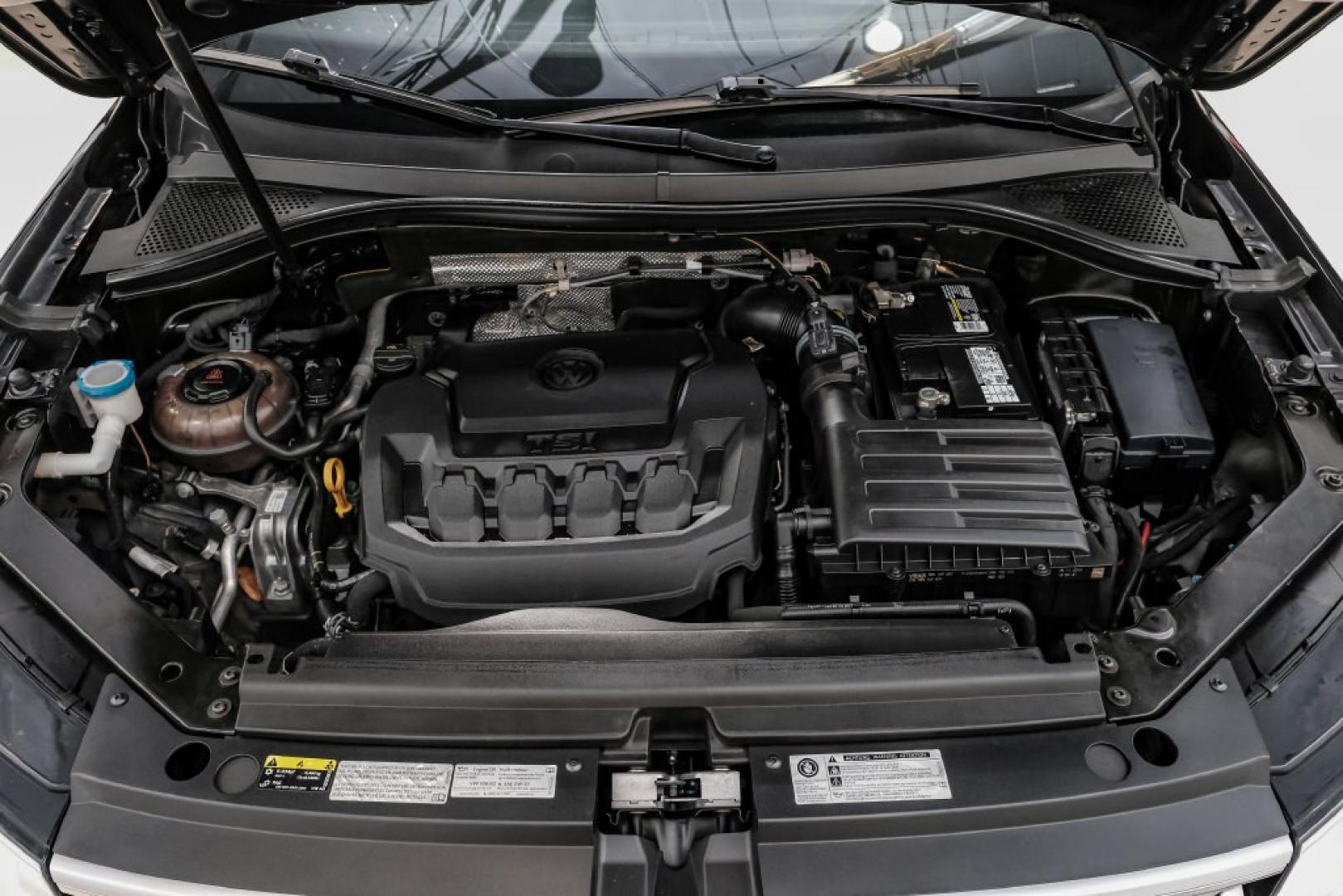 2019 Deep Black /Titan Black Volkswagen Tiguan 2.0T SEL R-Line (3VV2B7AX5KM) with an 2.0L TSI DOHC engine, Automatic transmission, located at 15300 Midway Rd., Addison, TX, 75001, (972) 702-0011, 32.958321, -96.838074- Photo#60