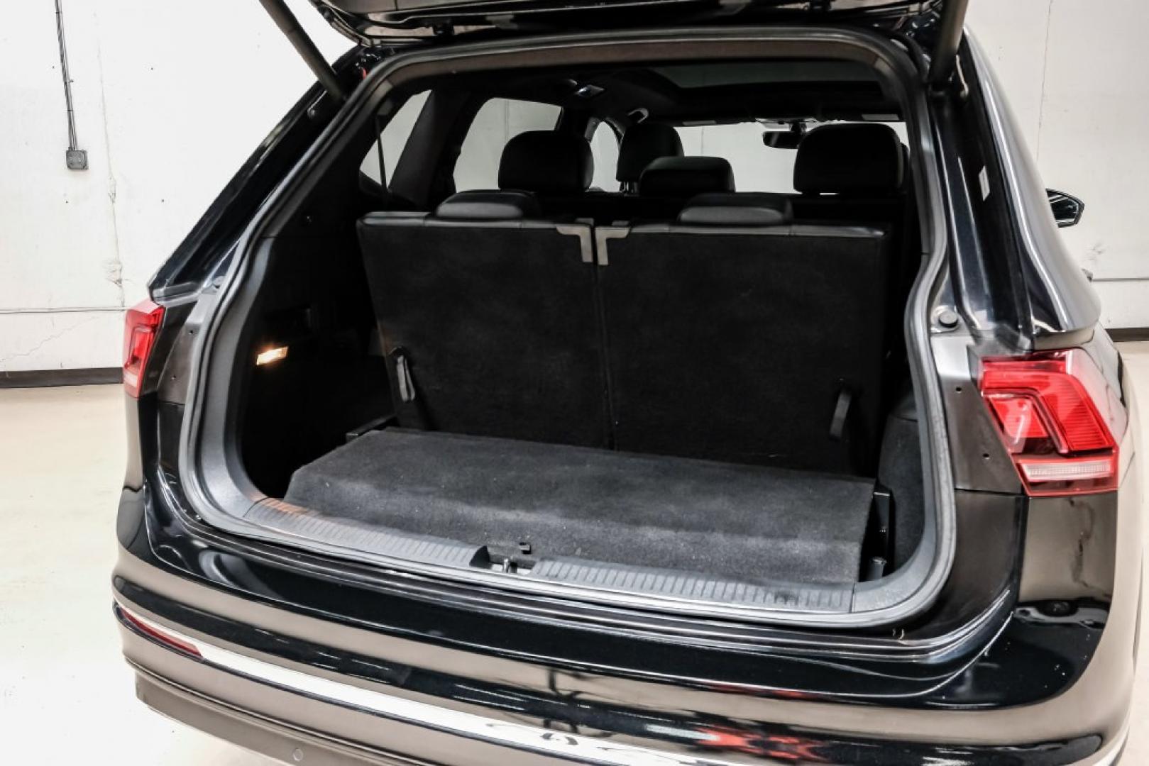 2019 Deep Black /Titan Black Volkswagen Tiguan 2.0T SEL R-Line (3VV2B7AX5KM) with an 2.0L TSI DOHC engine, Automatic transmission, located at 15300 Midway Rd., Addison, TX, 75001, (972) 702-0011, 32.958321, -96.838074- Photo#62