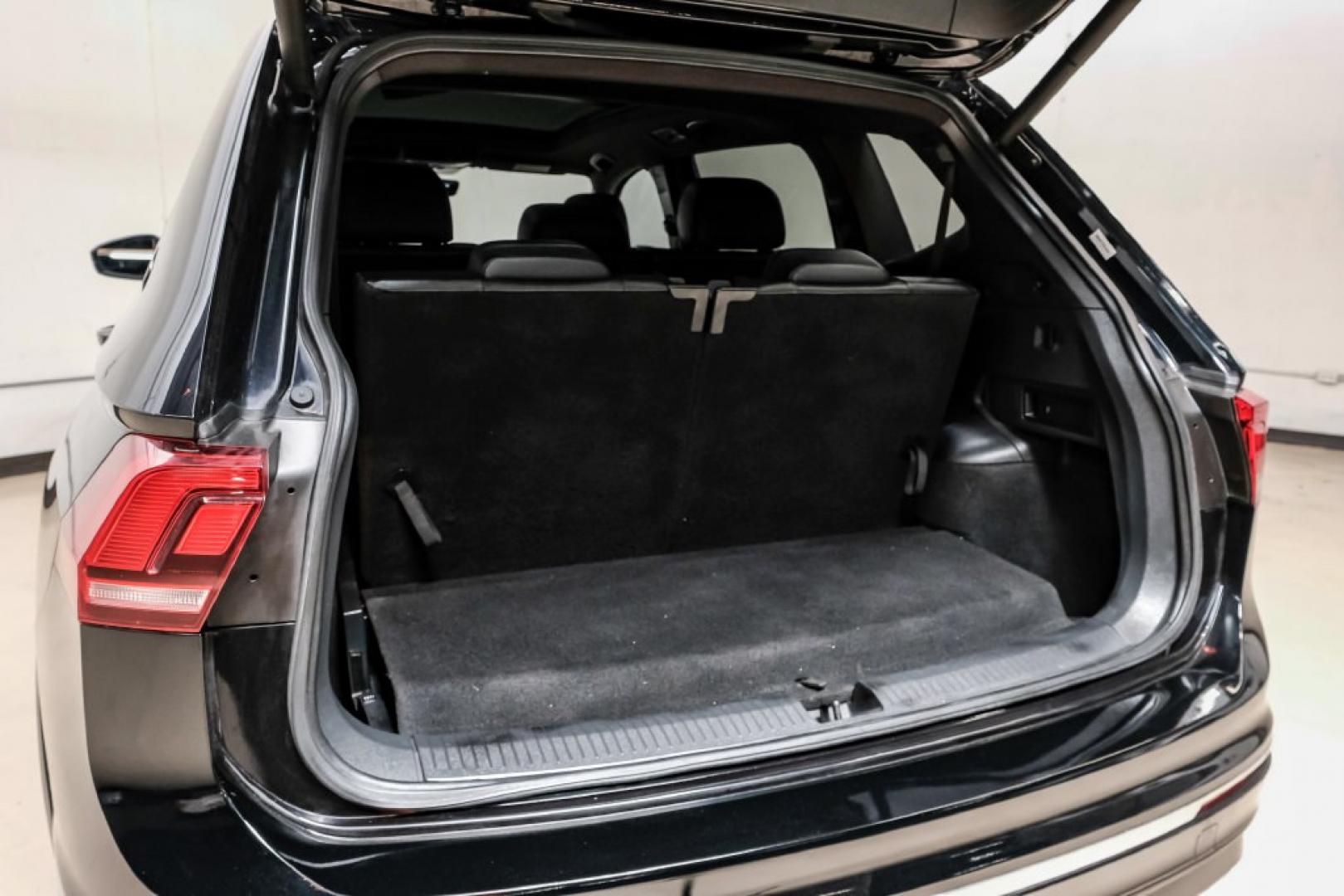 2019 Deep Black /Titan Black Volkswagen Tiguan 2.0T SEL R-Line (3VV2B7AX5KM) with an 2.0L TSI DOHC engine, Automatic transmission, located at 15300 Midway Rd., Addison, TX, 75001, (972) 702-0011, 32.958321, -96.838074- Photo#63