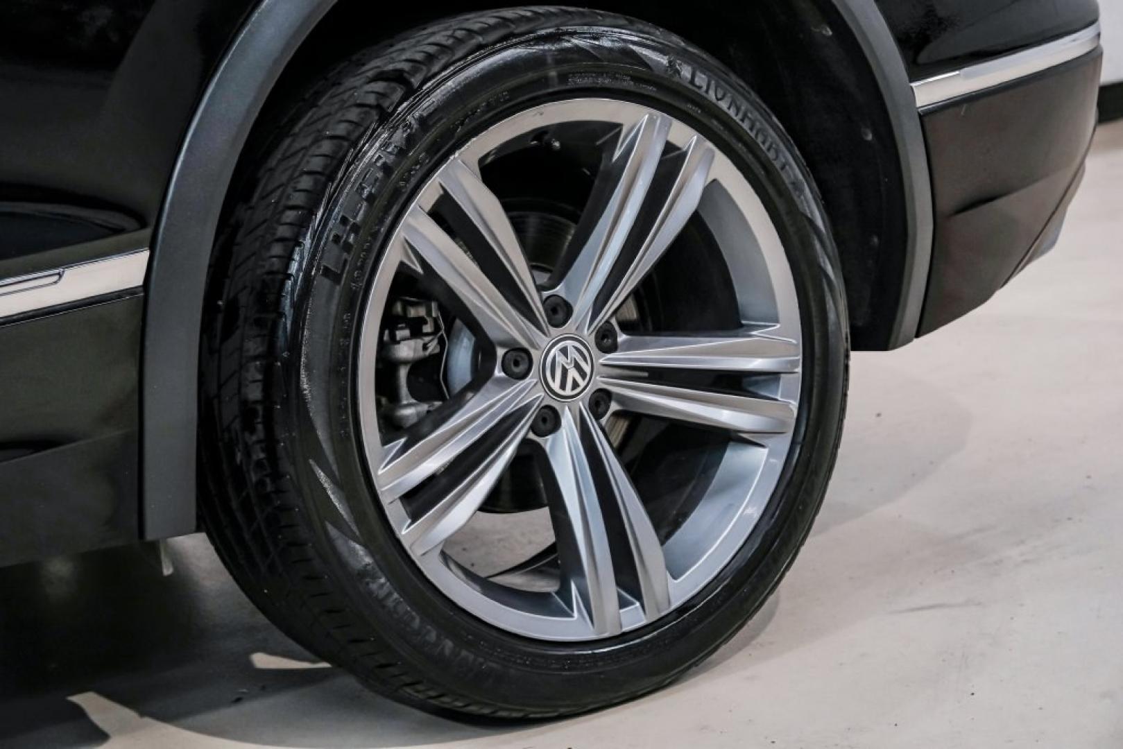 2019 Deep Black /Titan Black Volkswagen Tiguan 2.0T SEL R-Line (3VV2B7AX5KM) with an 2.0L TSI DOHC engine, Automatic transmission, located at 15300 Midway Rd., Addison, TX, 75001, (972) 702-0011, 32.958321, -96.838074- Photo#68