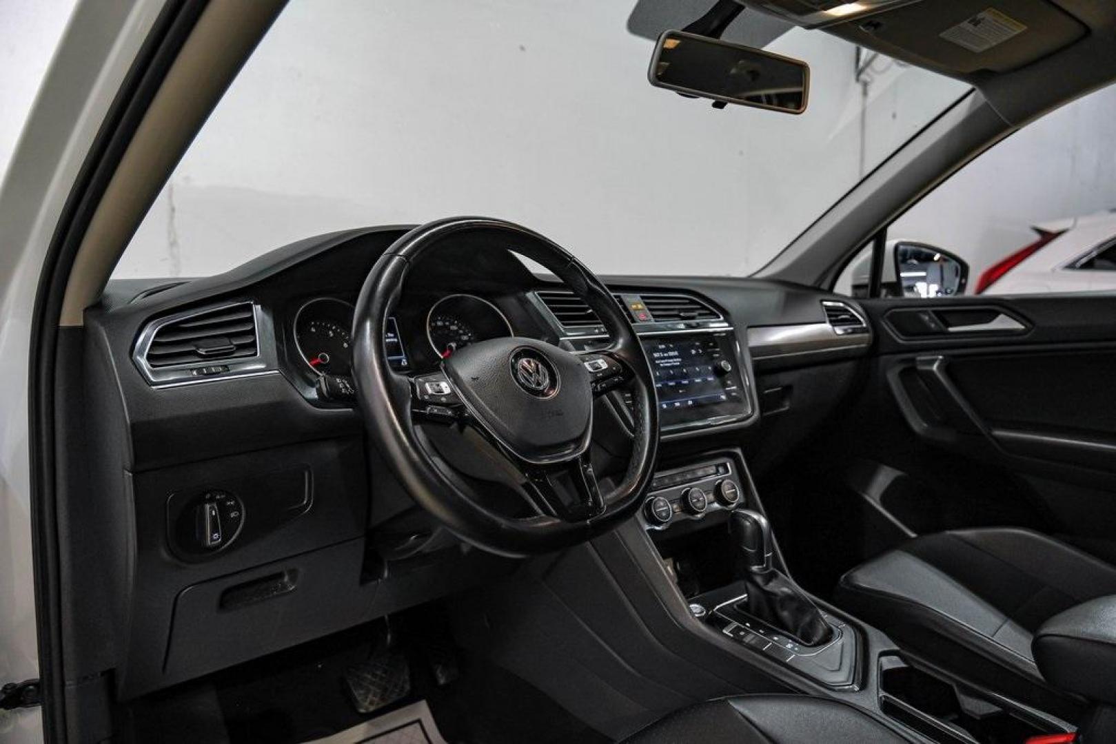 2019 Pure White /Titan Black Volkswagen Tiguan 2.0T SE (3VV3B7AX4KM) with an 2.0L TSI DOHC engine, Automatic transmission, located at 15300 Midway Rd., Addison, TX, 75001, (972) 702-0011, 32.958321, -96.838074 - Photo#2