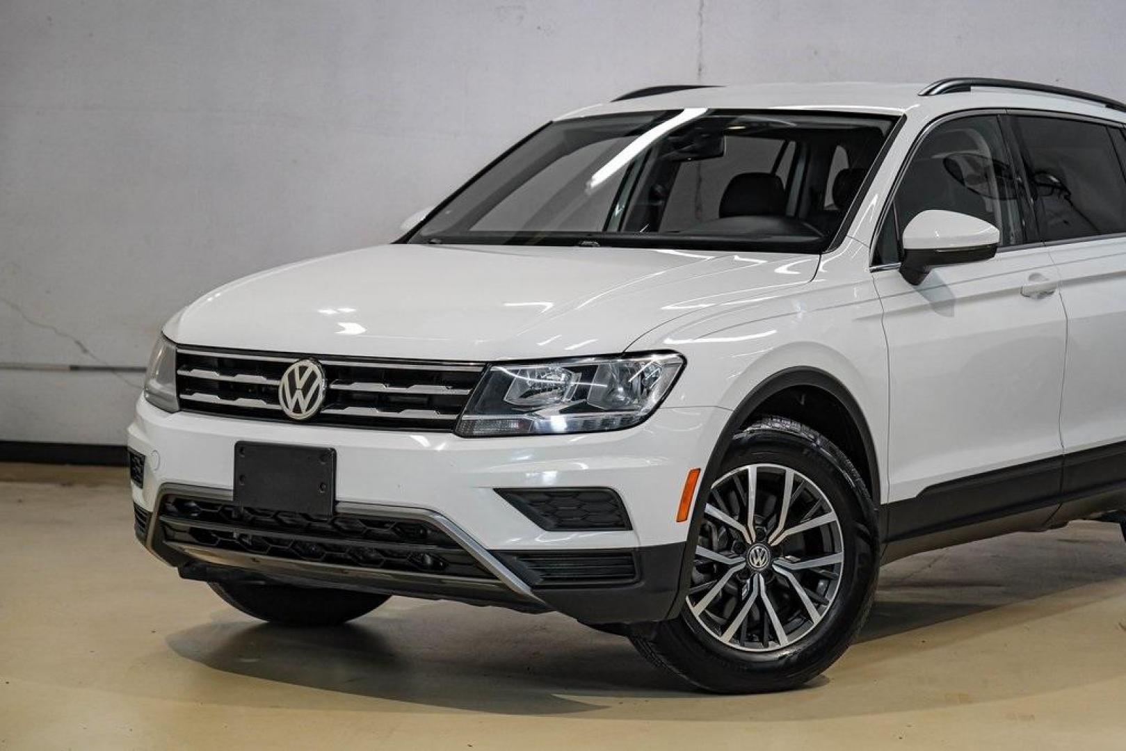 2019 Pure White /Titan Black Volkswagen Tiguan 2.0T SE (3VV3B7AX4KM) with an 2.0L TSI DOHC engine, Automatic transmission, located at 15300 Midway Rd., Addison, TX, 75001, (972) 702-0011, 32.958321, -96.838074 - Photo#4