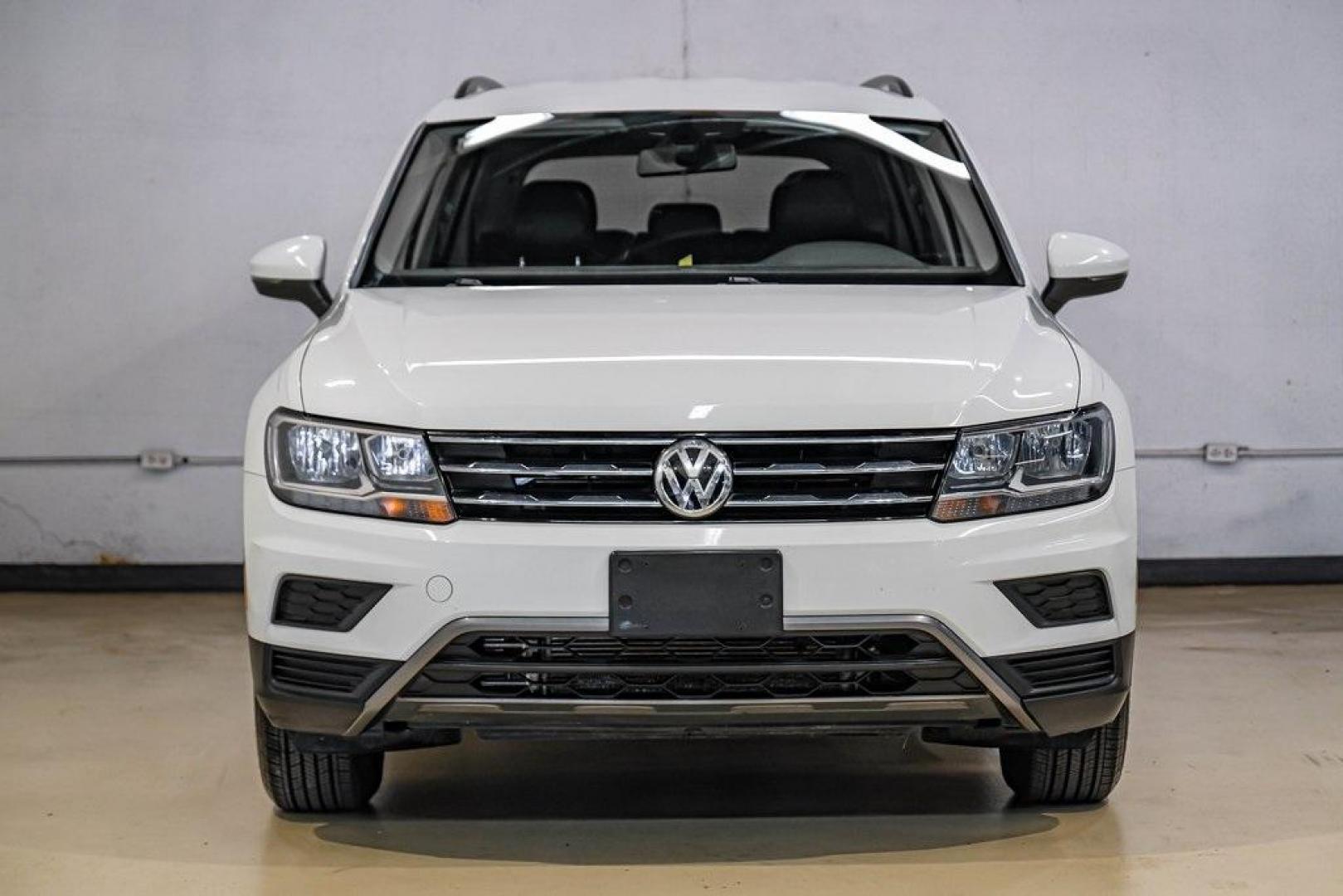 2019 Pure White /Titan Black Volkswagen Tiguan 2.0T SE (3VV3B7AX4KM) with an 2.0L TSI DOHC engine, Automatic transmission, located at 15300 Midway Rd., Addison, TX, 75001, (972) 702-0011, 32.958321, -96.838074 - Photo#6