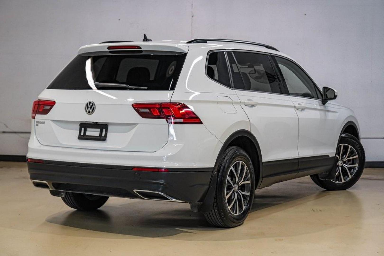 2019 Pure White /Titan Black Volkswagen Tiguan 2.0T SE (3VV3B7AX4KM) with an 2.0L TSI DOHC engine, Automatic transmission, located at 15300 Midway Rd., Addison, TX, 75001, (972) 702-0011, 32.958321, -96.838074 - Photo#9