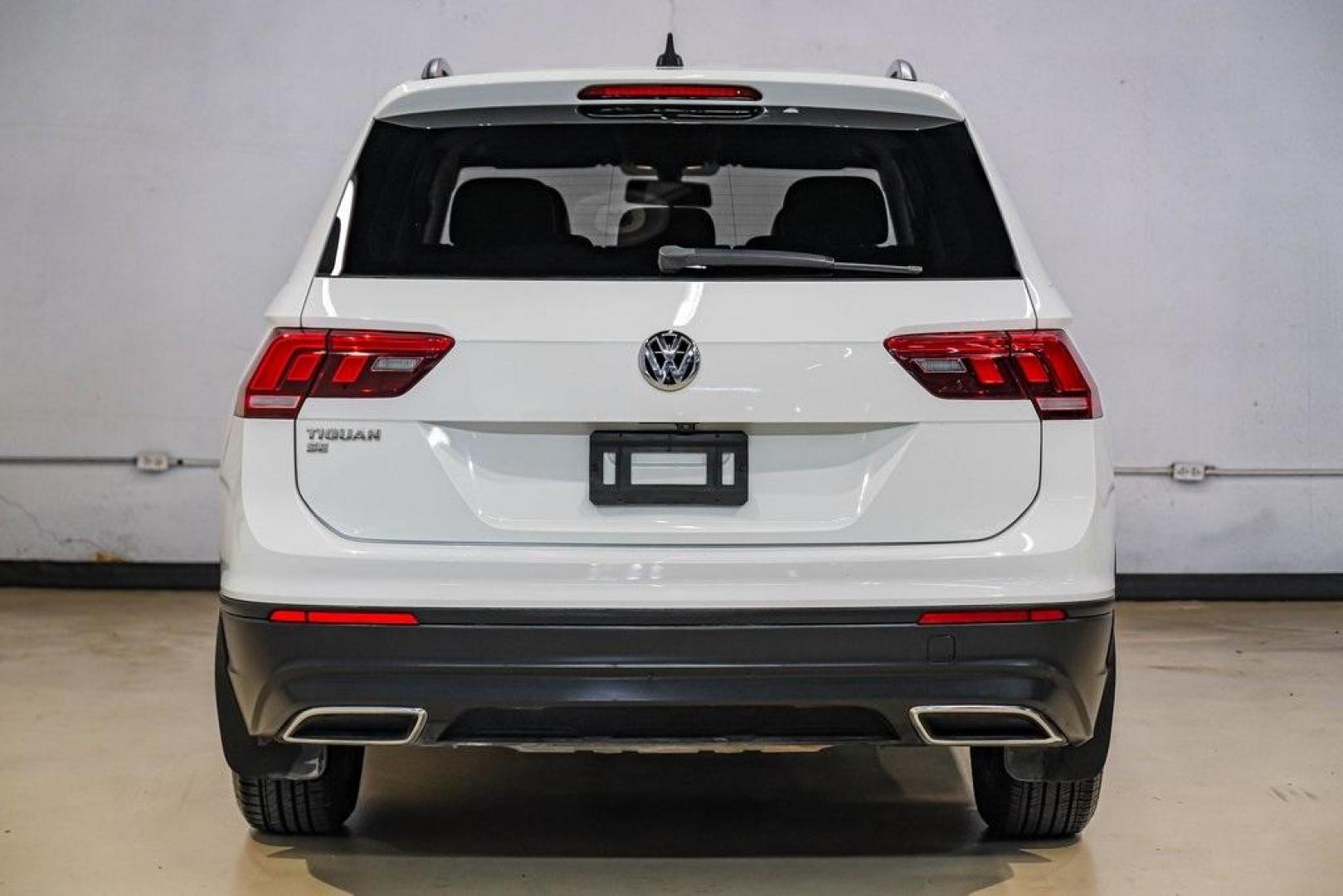 2019 Pure White /Titan Black Volkswagen Tiguan 2.0T SE (3VV3B7AX4KM) with an 2.0L TSI DOHC engine, Automatic transmission, located at 15300 Midway Rd., Addison, TX, 75001, (972) 702-0011, 32.958321, -96.838074 - Photo#10