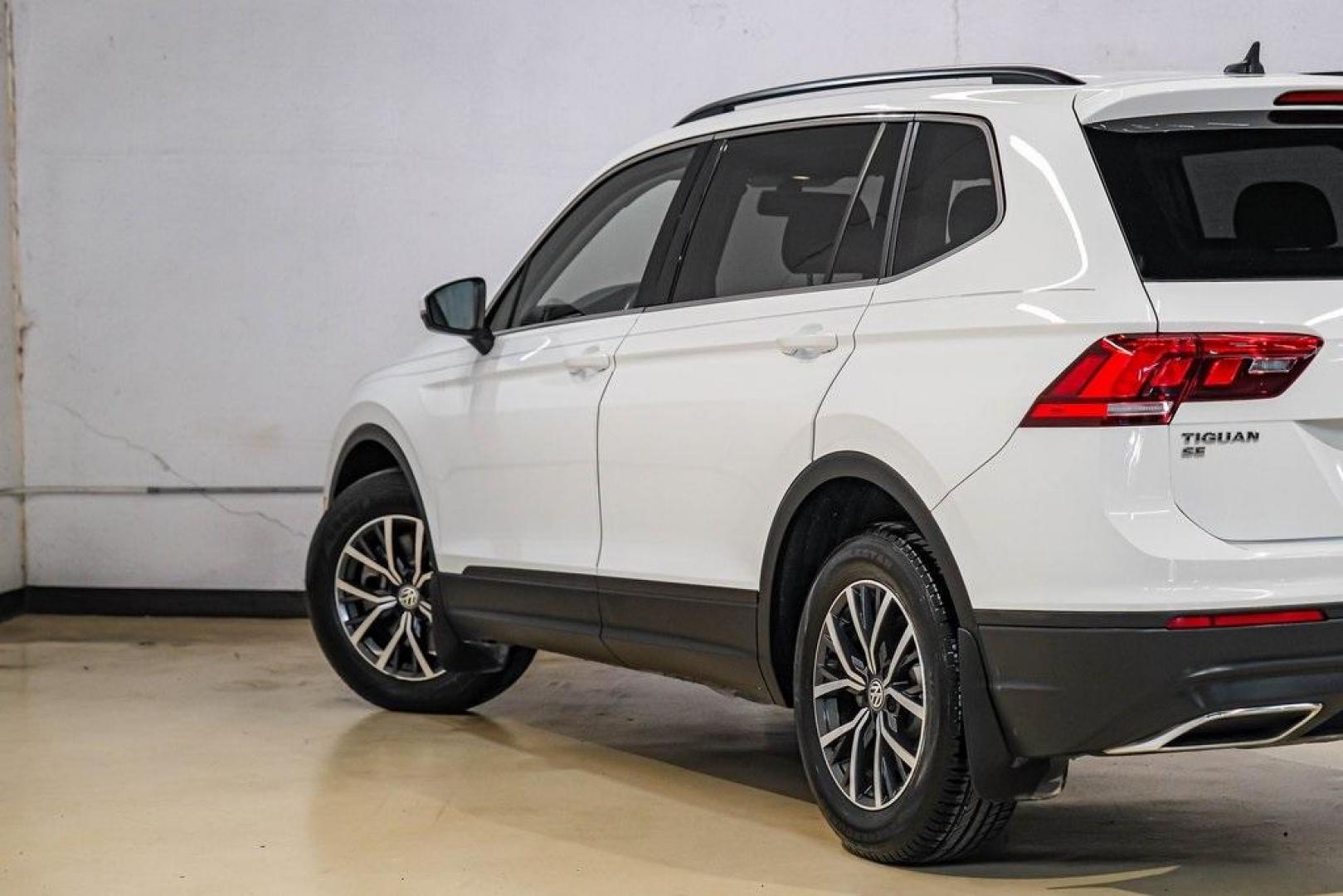 2019 Pure White /Titan Black Volkswagen Tiguan 2.0T SE (3VV3B7AX4KM) with an 2.0L TSI DOHC engine, Automatic transmission, located at 15300 Midway Rd., Addison, TX, 75001, (972) 702-0011, 32.958321, -96.838074 - Photo#12