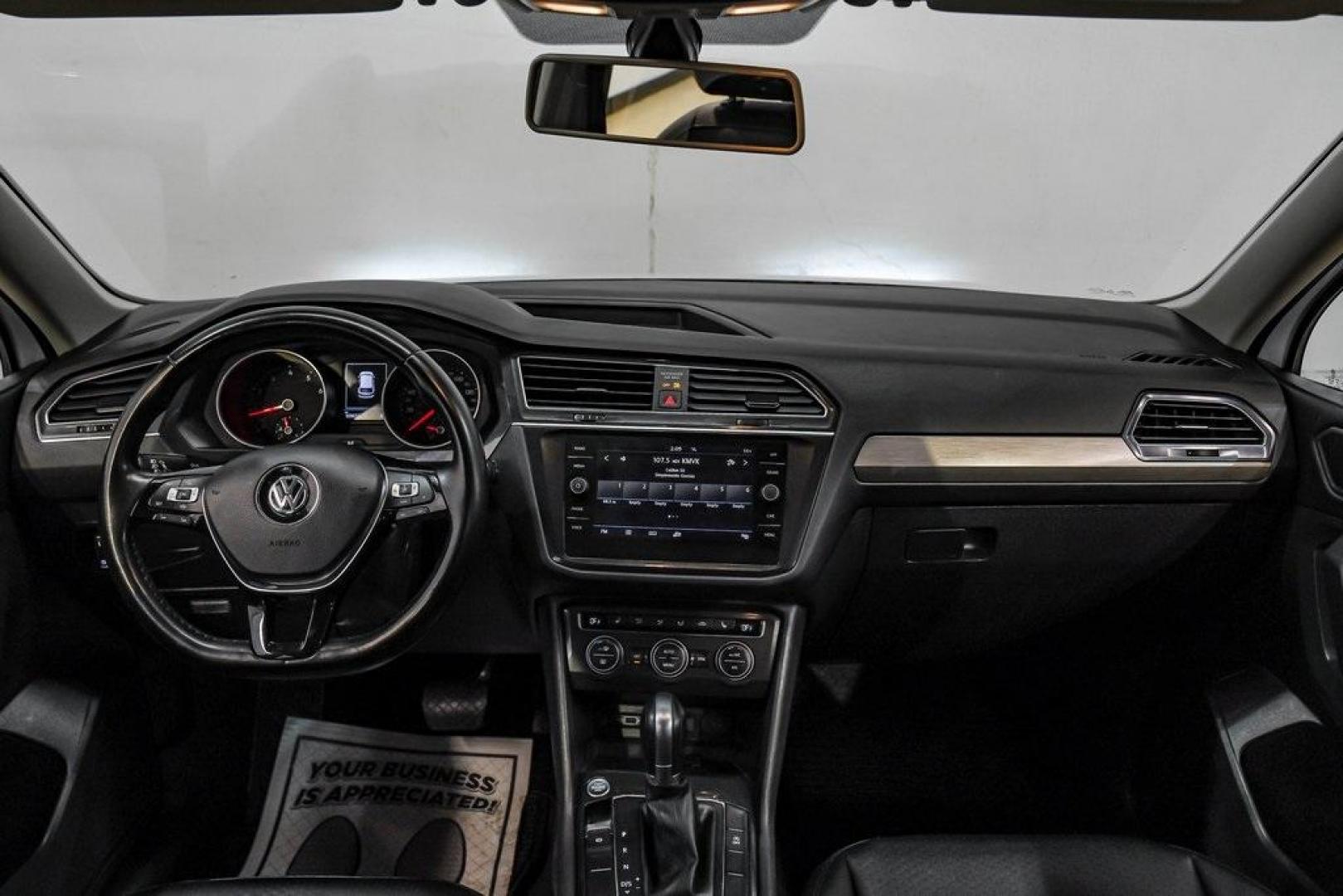 2019 Pure White /Titan Black Volkswagen Tiguan 2.0T SE (3VV3B7AX4KM) with an 2.0L TSI DOHC engine, Automatic transmission, located at 15300 Midway Rd., Addison, TX, 75001, (972) 702-0011, 32.958321, -96.838074 - Photo#18