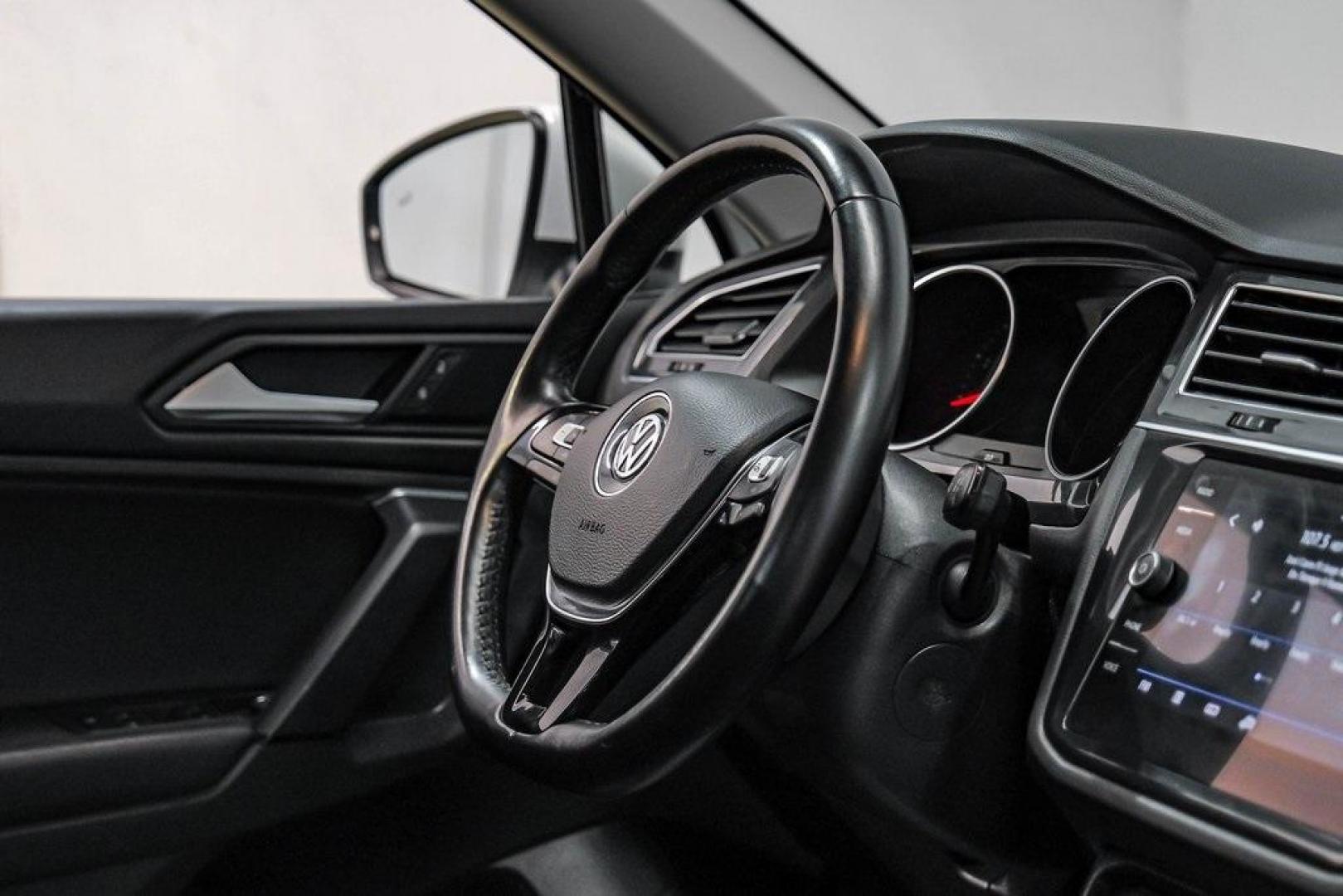 2019 Pure White /Titan Black Volkswagen Tiguan 2.0T SE (3VV3B7AX4KM) with an 2.0L TSI DOHC engine, Automatic transmission, located at 15300 Midway Rd., Addison, TX, 75001, (972) 702-0011, 32.958321, -96.838074 - Photo#19