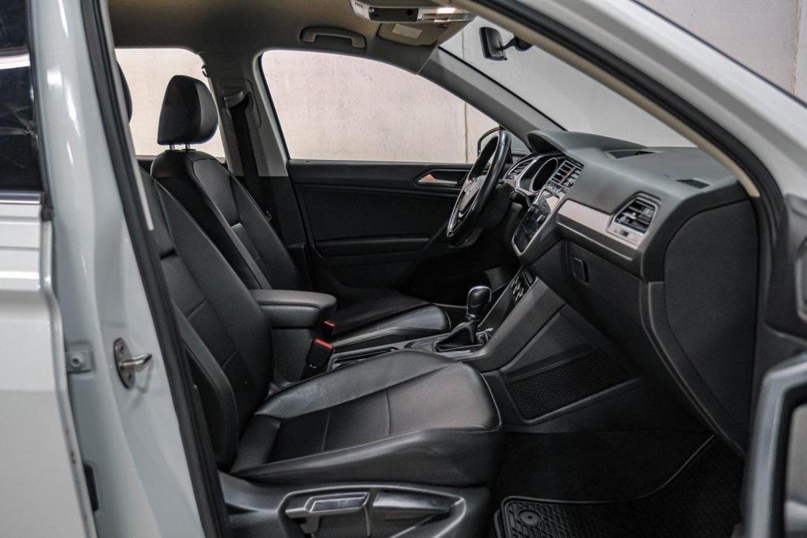 2019 Pure White /Titan Black Volkswagen Tiguan 2.0T SE (3VV3B7AX4KM) with an 2.0L TSI DOHC engine, Automatic transmission, located at 15300 Midway Rd., Addison, TX, 75001, (972) 702-0011, 32.958321, -96.838074 - Photo#36
