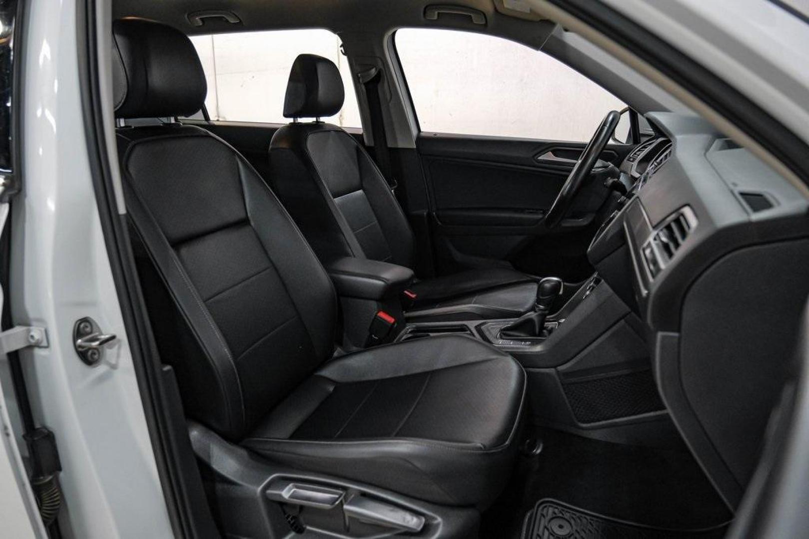 2019 Pure White /Titan Black Volkswagen Tiguan 2.0T SE (3VV3B7AX4KM) with an 2.0L TSI DOHC engine, Automatic transmission, located at 15300 Midway Rd., Addison, TX, 75001, (972) 702-0011, 32.958321, -96.838074 - Photo#37