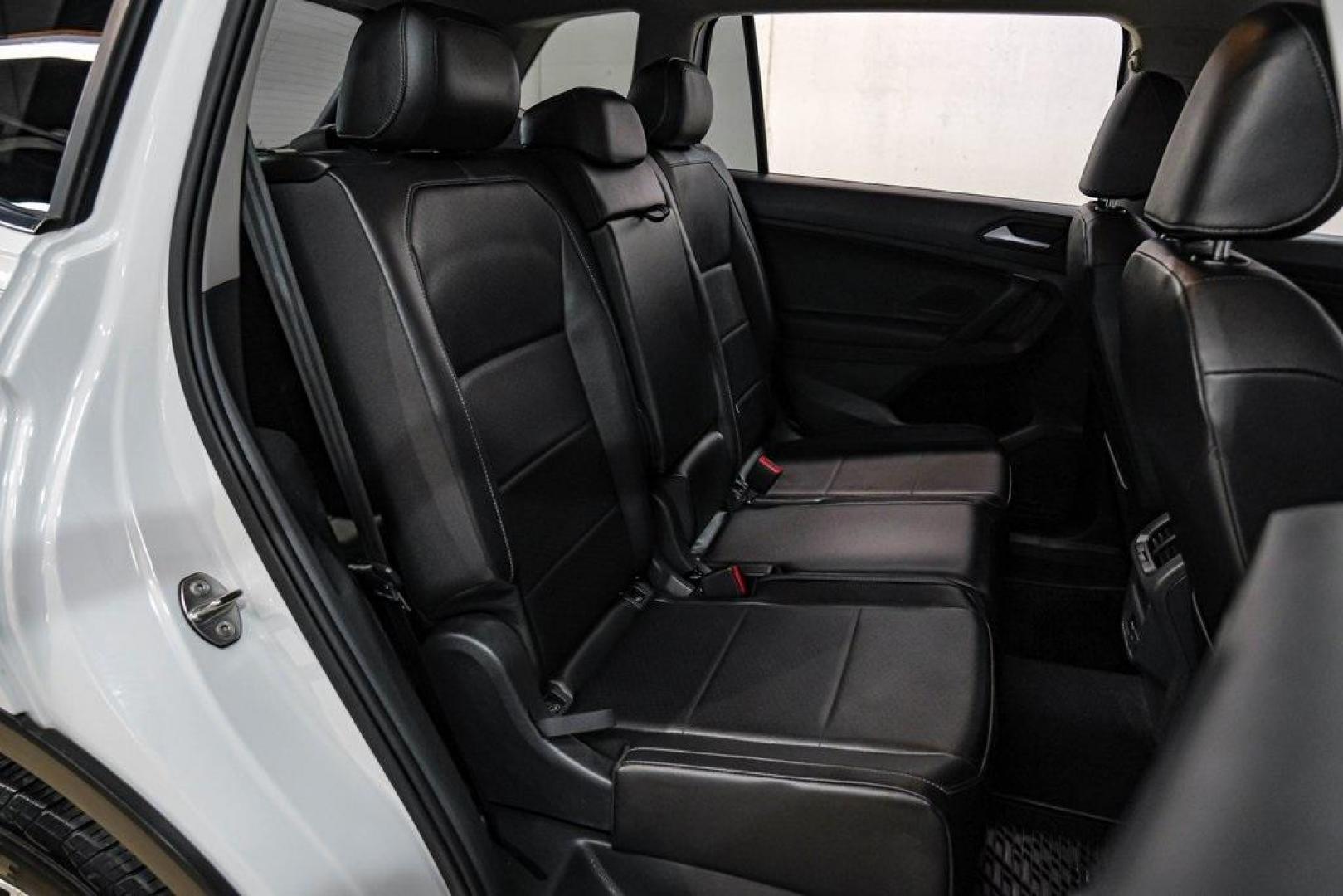 2019 Pure White /Titan Black Volkswagen Tiguan 2.0T SE (3VV3B7AX4KM) with an 2.0L TSI DOHC engine, Automatic transmission, located at 15300 Midway Rd., Addison, TX, 75001, (972) 702-0011, 32.958321, -96.838074 - Photo#38