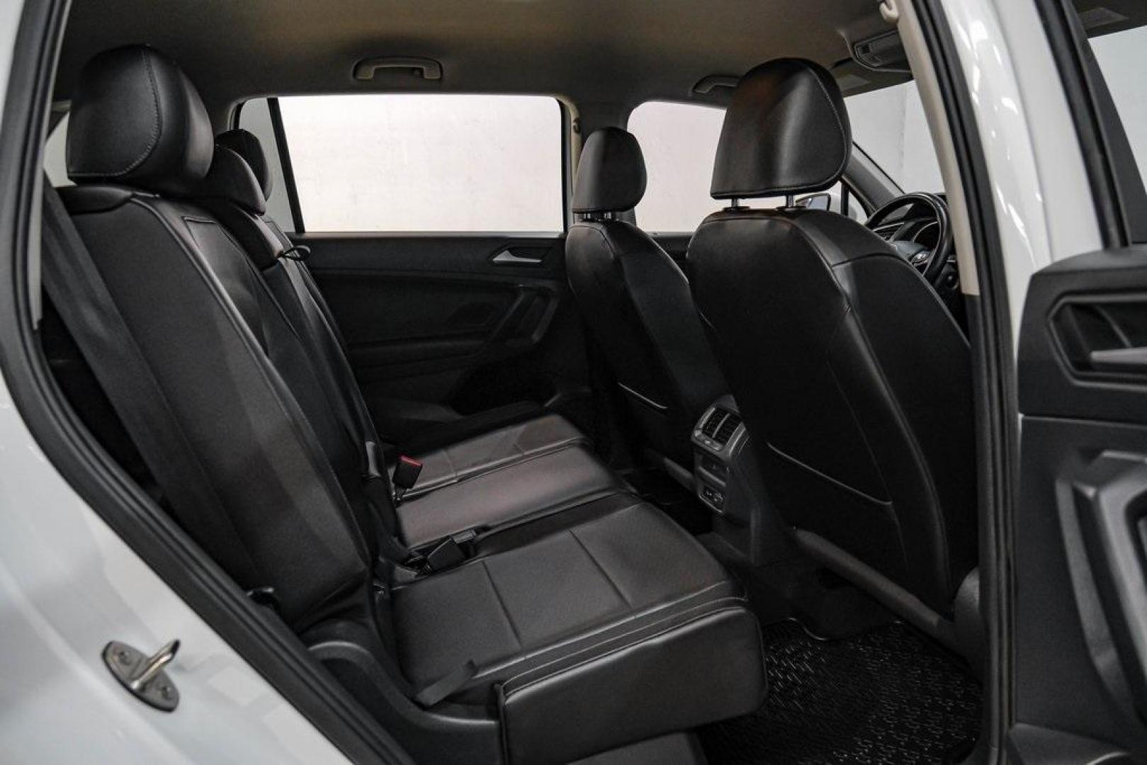 2019 Pure White /Titan Black Volkswagen Tiguan 2.0T SE (3VV3B7AX4KM) with an 2.0L TSI DOHC engine, Automatic transmission, located at 15300 Midway Rd., Addison, TX, 75001, (972) 702-0011, 32.958321, -96.838074 - Photo#39