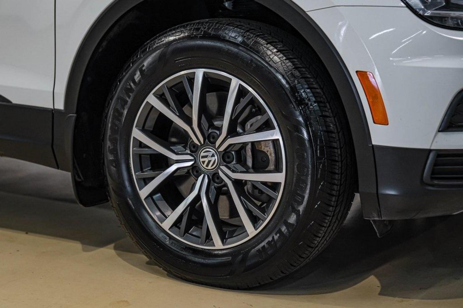 2019 Pure White /Titan Black Volkswagen Tiguan 2.0T SE (3VV3B7AX4KM) with an 2.0L TSI DOHC engine, Automatic transmission, located at 15300 Midway Rd., Addison, TX, 75001, (972) 702-0011, 32.958321, -96.838074 - Photo#58