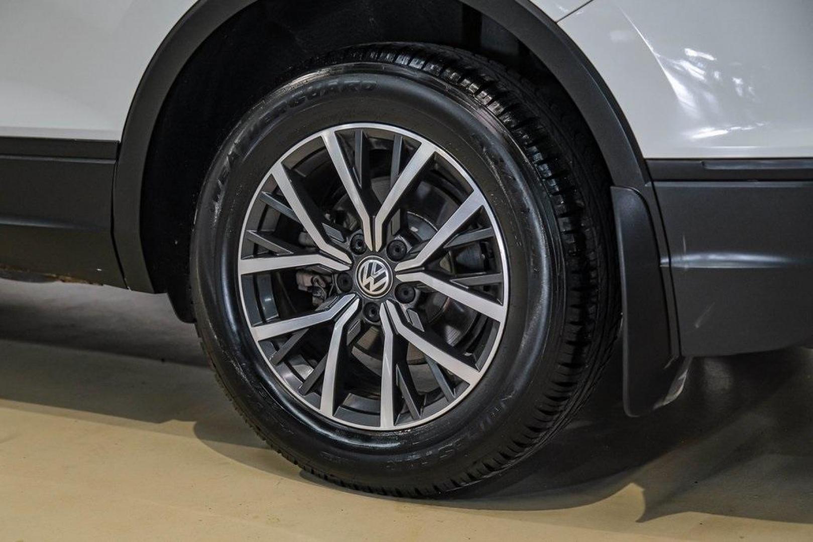 2019 Pure White /Titan Black Volkswagen Tiguan 2.0T SE (3VV3B7AX4KM) with an 2.0L TSI DOHC engine, Automatic transmission, located at 15300 Midway Rd., Addison, TX, 75001, (972) 702-0011, 32.958321, -96.838074 - Photo#60