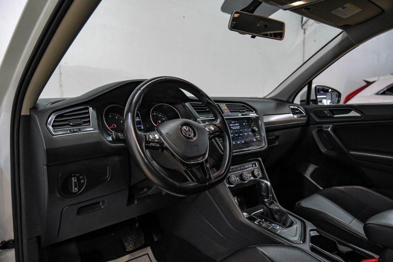 2019 Pure White /Titan Black Volkswagen Tiguan 2.0T SE (3VV3B7AX4KM) with an 2.0L TSI DOHC engine, Automatic transmission, located at 15300 Midway Rd., Addison, TX, 75001, (972) 702-0011, 32.958321, -96.838074 - Photo#2