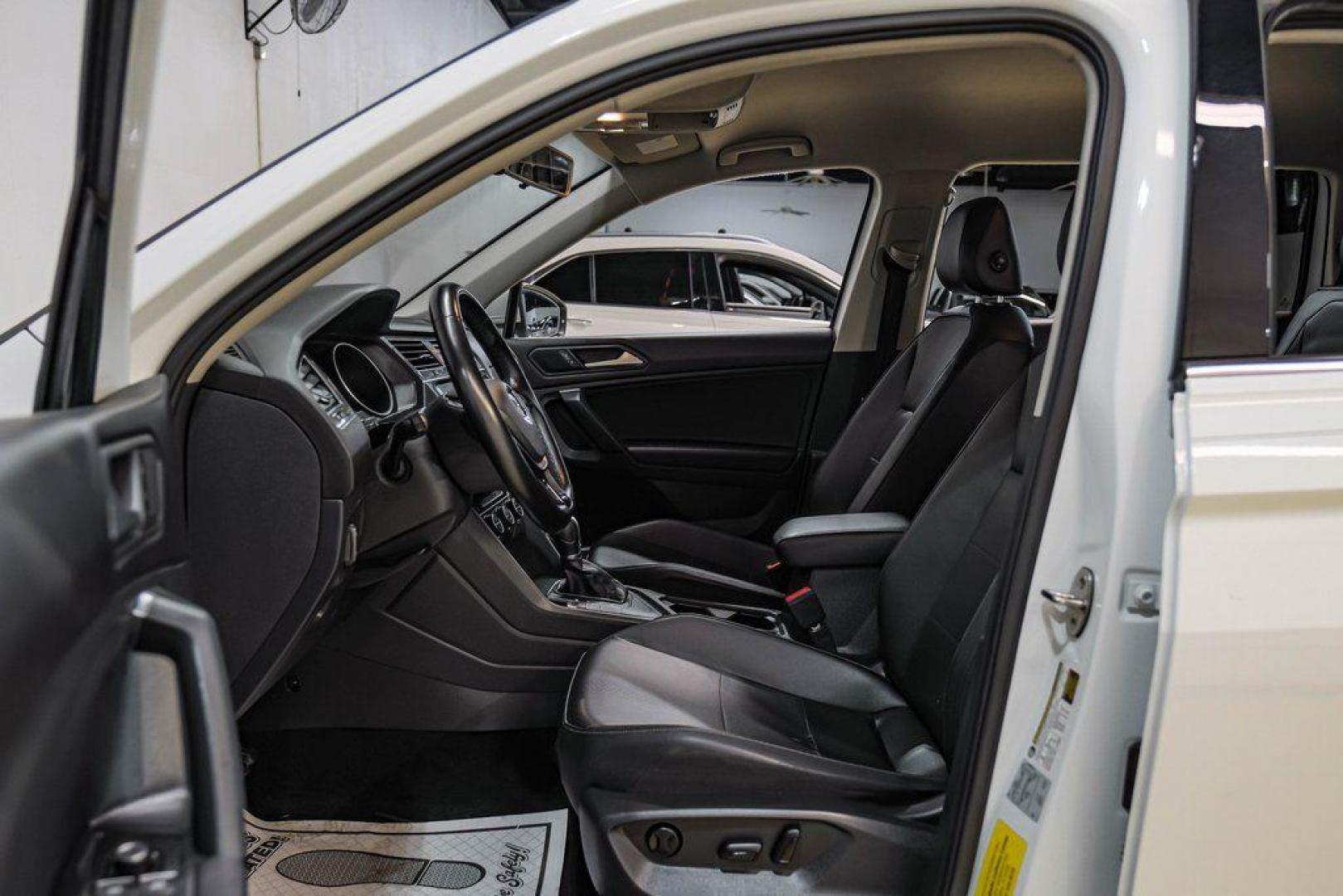 2019 Pure White /Titan Black Volkswagen Tiguan 2.0T SE (3VV3B7AX4KM) with an 2.0L TSI DOHC engine, Automatic transmission, located at 15300 Midway Rd., Addison, TX, 75001, (972) 702-0011, 32.958321, -96.838074 - Photo#3