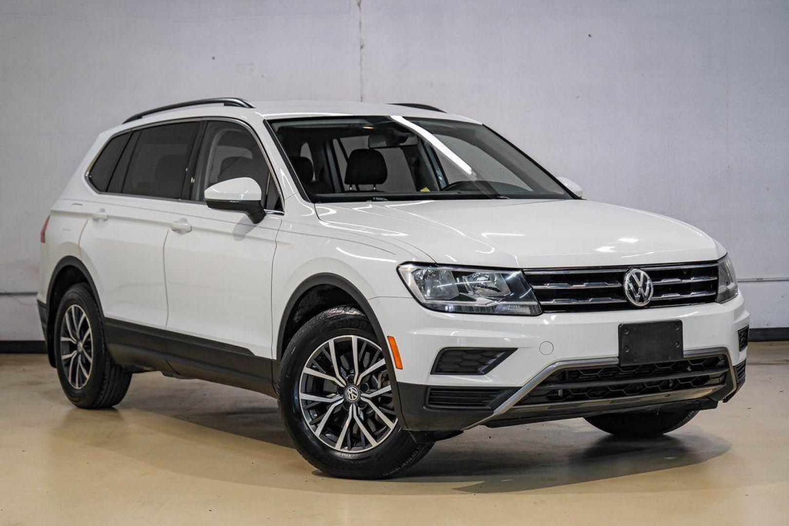 2019 Pure White /Titan Black Volkswagen Tiguan 2.0T SE (3VV3B7AX4KM) with an 2.0L TSI DOHC engine, Automatic transmission, located at 15300 Midway Rd., Addison, TX, 75001, (972) 702-0011, 32.958321, -96.838074 - Photo#7