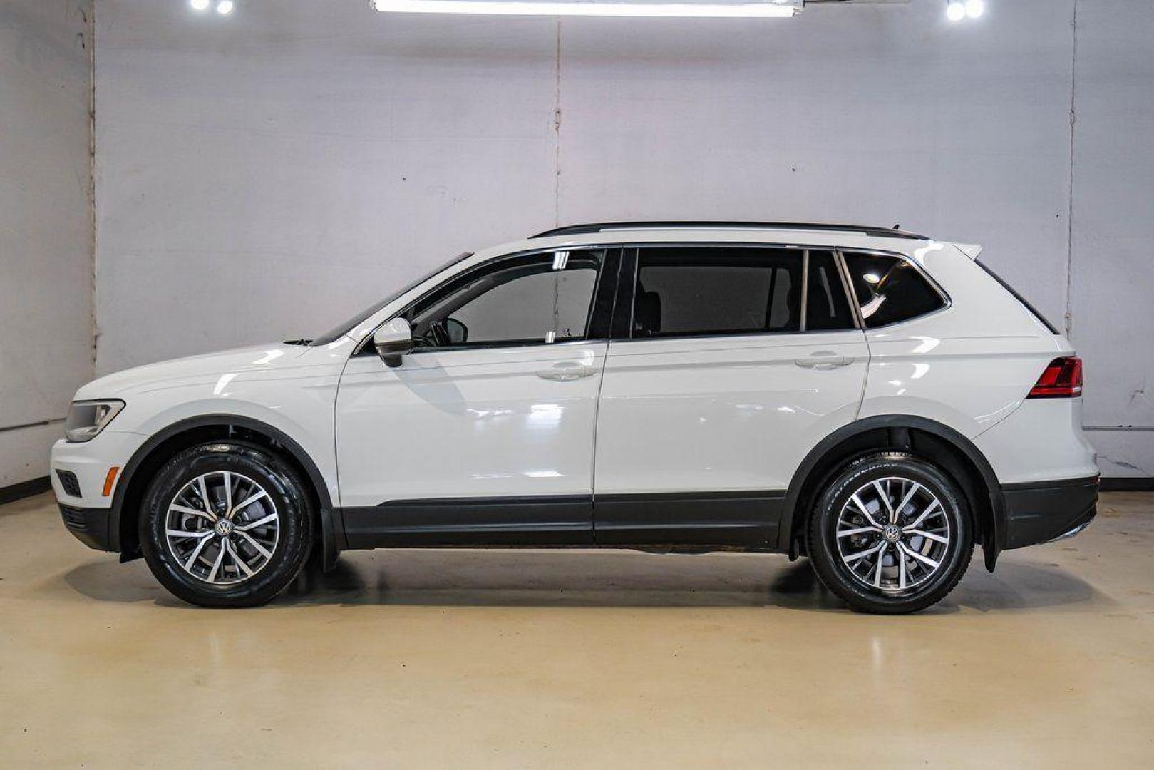 2019 Pure White /Titan Black Volkswagen Tiguan 2.0T SE (3VV3B7AX4KM) with an 2.0L TSI DOHC engine, Automatic transmission, located at 15300 Midway Rd., Addison, TX, 75001, (972) 702-0011, 32.958321, -96.838074 - Photo#14