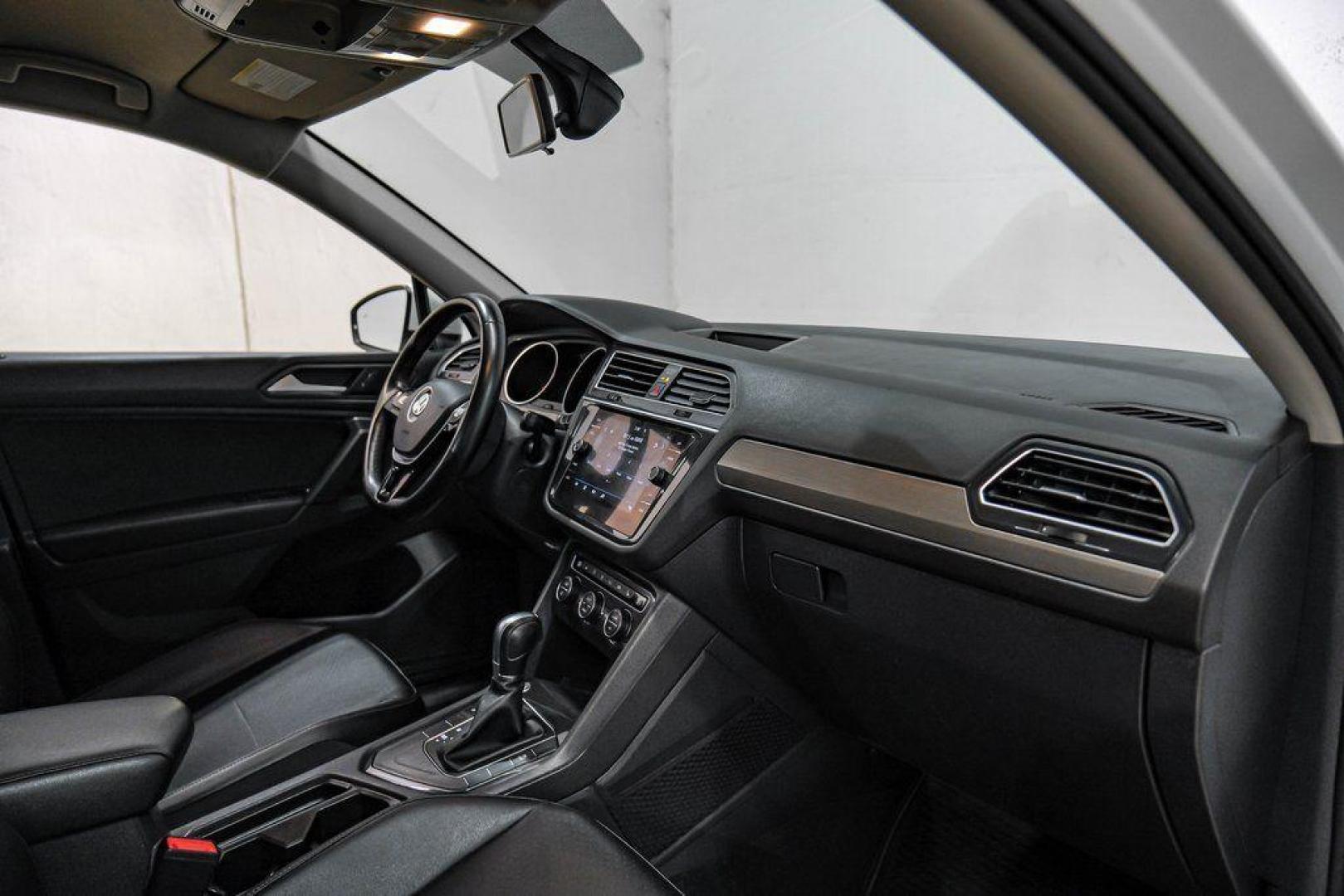 2019 Pure White /Titan Black Volkswagen Tiguan 2.0T SE (3VV3B7AX4KM) with an 2.0L TSI DOHC engine, Automatic transmission, located at 15300 Midway Rd., Addison, TX, 75001, (972) 702-0011, 32.958321, -96.838074 - Photo#17