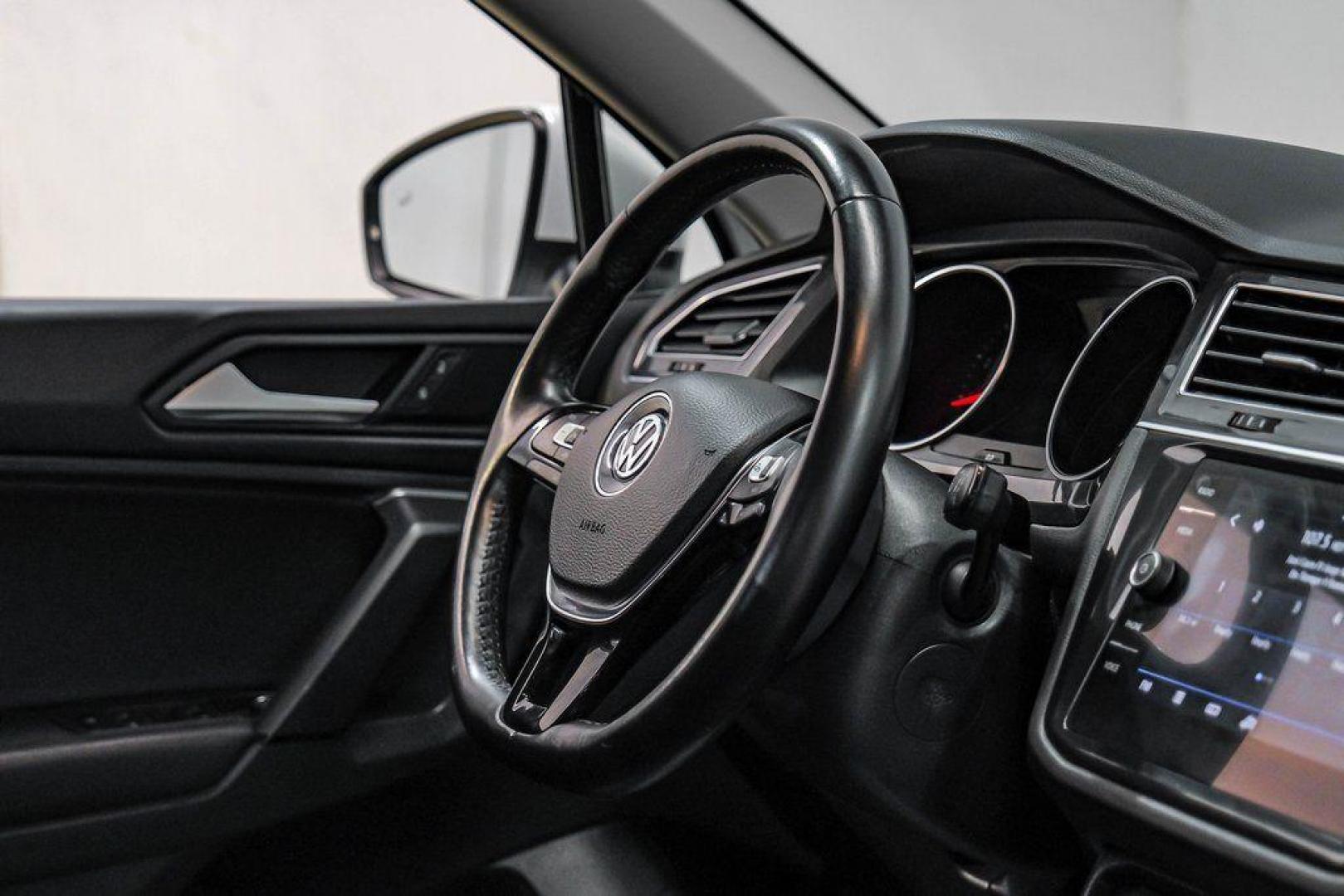 2019 Pure White /Titan Black Volkswagen Tiguan 2.0T SE (3VV3B7AX4KM) with an 2.0L TSI DOHC engine, Automatic transmission, located at 15300 Midway Rd., Addison, TX, 75001, (972) 702-0011, 32.958321, -96.838074 - Photo#19