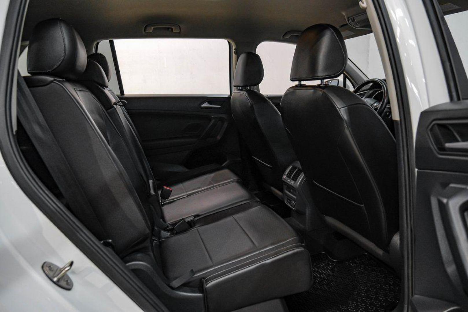 2019 Pure White /Titan Black Volkswagen Tiguan 2.0T SE (3VV3B7AX4KM) with an 2.0L TSI DOHC engine, Automatic transmission, located at 15300 Midway Rd., Addison, TX, 75001, (972) 702-0011, 32.958321, -96.838074 - Photo#39