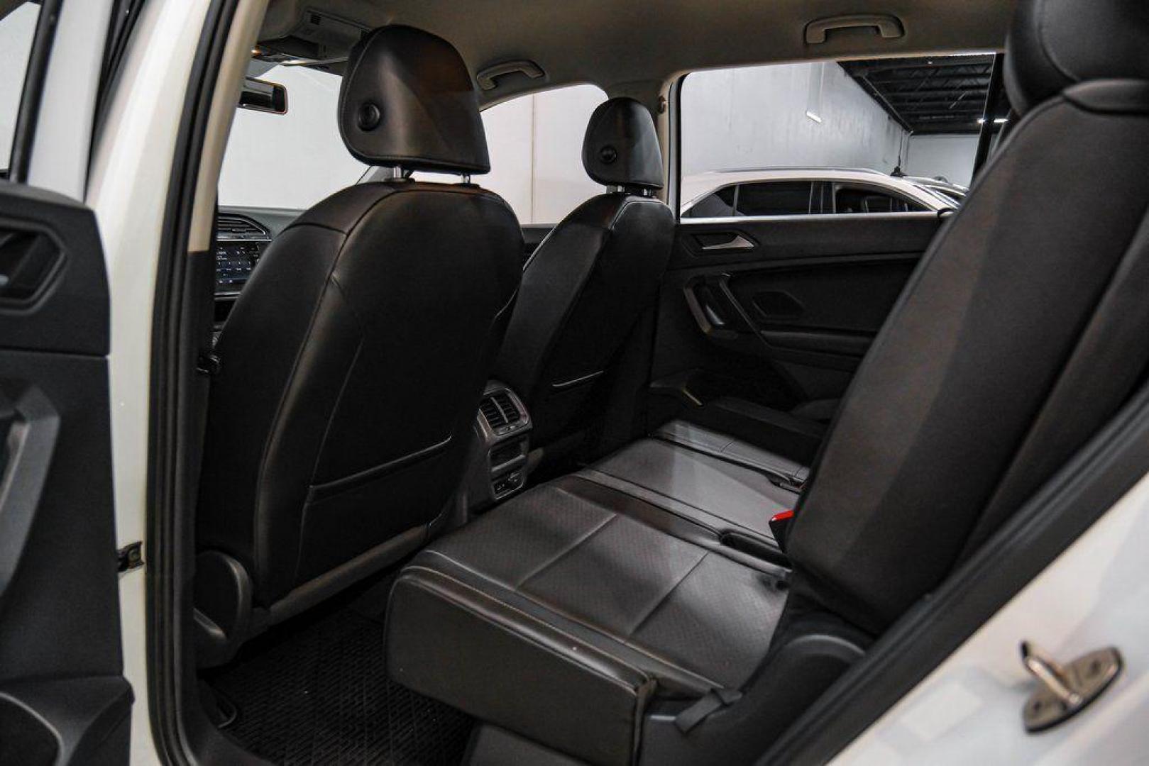 2019 Pure White /Titan Black Volkswagen Tiguan 2.0T SE (3VV3B7AX4KM) with an 2.0L TSI DOHC engine, Automatic transmission, located at 15300 Midway Rd., Addison, TX, 75001, (972) 702-0011, 32.958321, -96.838074 - Photo#40