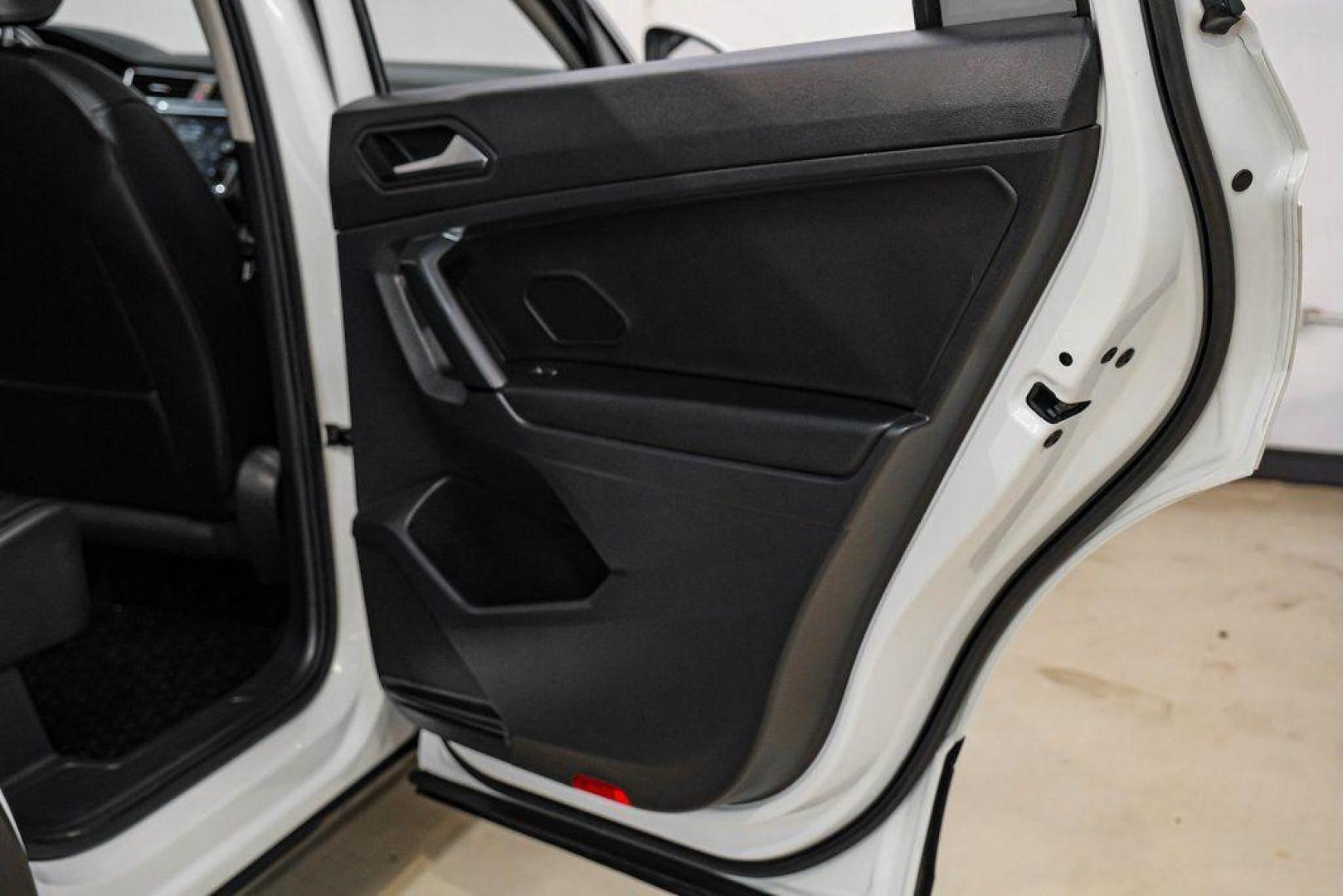 2019 Pure White /Titan Black Volkswagen Tiguan 2.0T SE (3VV3B7AX4KM) with an 2.0L TSI DOHC engine, Automatic transmission, located at 15300 Midway Rd., Addison, TX, 75001, (972) 702-0011, 32.958321, -96.838074 - Photo#49