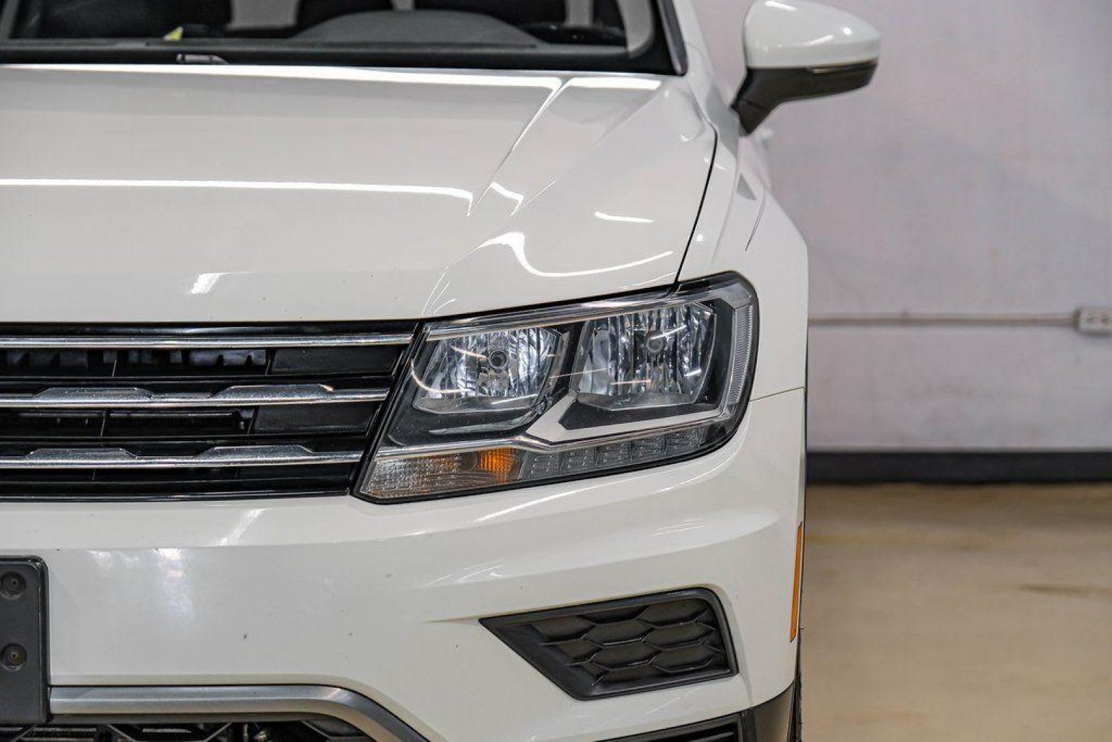 2019 Pure White /Titan Black Volkswagen Tiguan 2.0T SE (3VV3B7AX4KM) with an 2.0L TSI DOHC engine, Automatic transmission, located at 15300 Midway Rd., Addison, TX, 75001, (972) 702-0011, 32.958321, -96.838074 - Photo#50