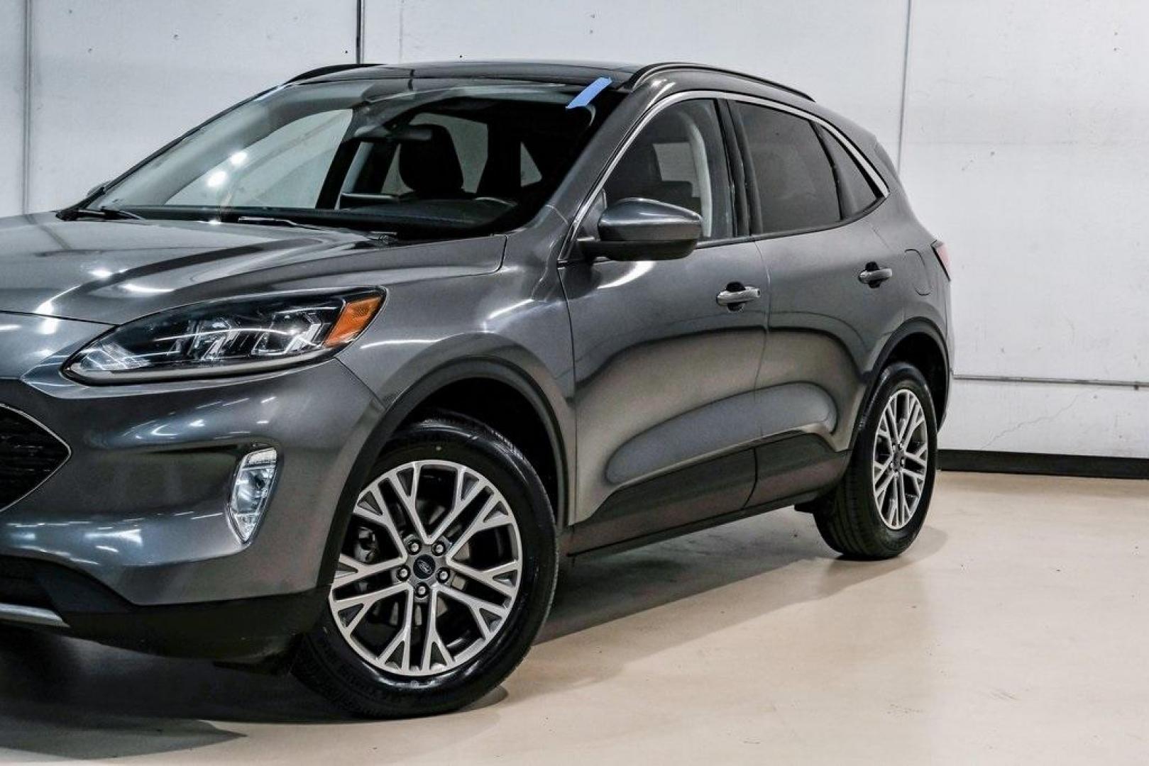 2021 Gray Metallic /Ebony Ford Escape SEL (1FMCU9H6XMU) with an 1.5L EcoBoost engine, Automatic transmission, located at 15300 Midway Rd., Addison, TX, 75001, (972) 702-0011, 32.958321, -96.838074 - Photo#6