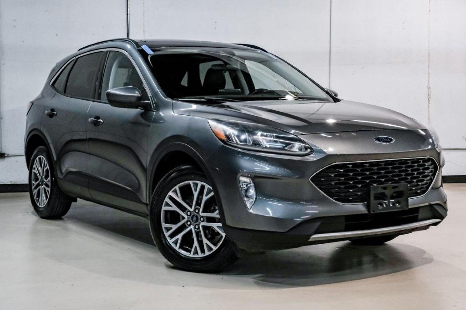 2021 Gray Metallic /Ebony Ford Escape SEL (1FMCU9H6XMU) with an 1.5L EcoBoost engine, Automatic transmission, located at 15300 Midway Rd., Addison, TX, 75001, (972) 702-0011, 32.958321, -96.838074 - Photo#8