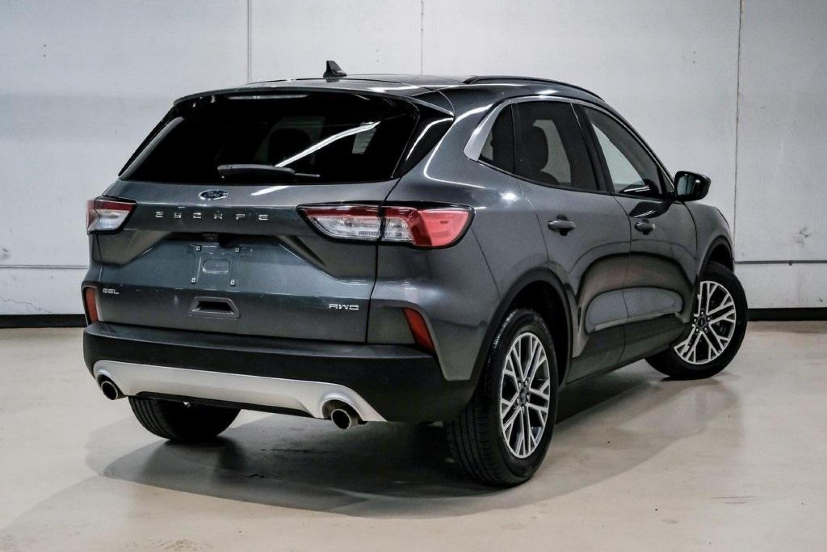 2021 Gray Metallic /Ebony Ford Escape SEL (1FMCU9H6XMU) with an 1.5L EcoBoost engine, Automatic transmission, located at 15300 Midway Rd., Addison, TX, 75001, (972) 702-0011, 32.958321, -96.838074 - Photo#10