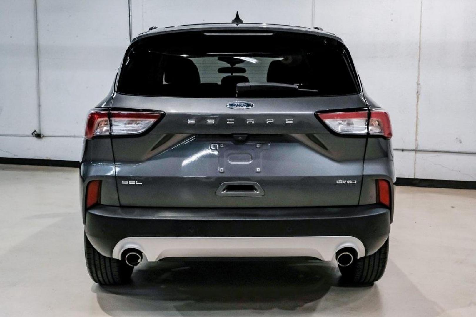 2021 Gray Metallic /Ebony Ford Escape SEL (1FMCU9H6XMU) with an 1.5L EcoBoost engine, Automatic transmission, located at 15300 Midway Rd., Addison, TX, 75001, (972) 702-0011, 32.958321, -96.838074 - Photo#11