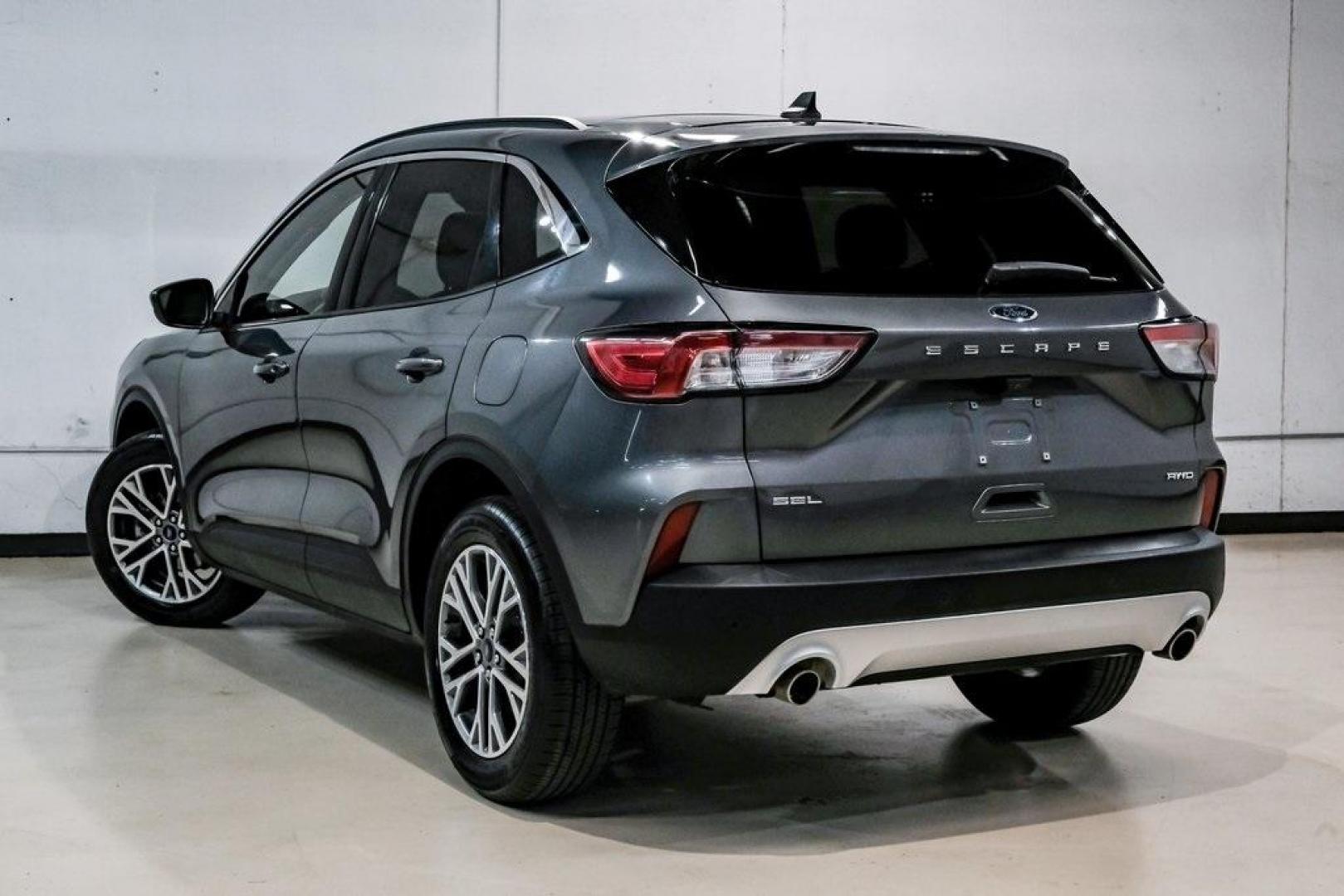 2021 Gray Metallic /Ebony Ford Escape SEL (1FMCU9H6XMU) with an 1.5L EcoBoost engine, Automatic transmission, located at 15300 Midway Rd., Addison, TX, 75001, (972) 702-0011, 32.958321, -96.838074 - Photo#12