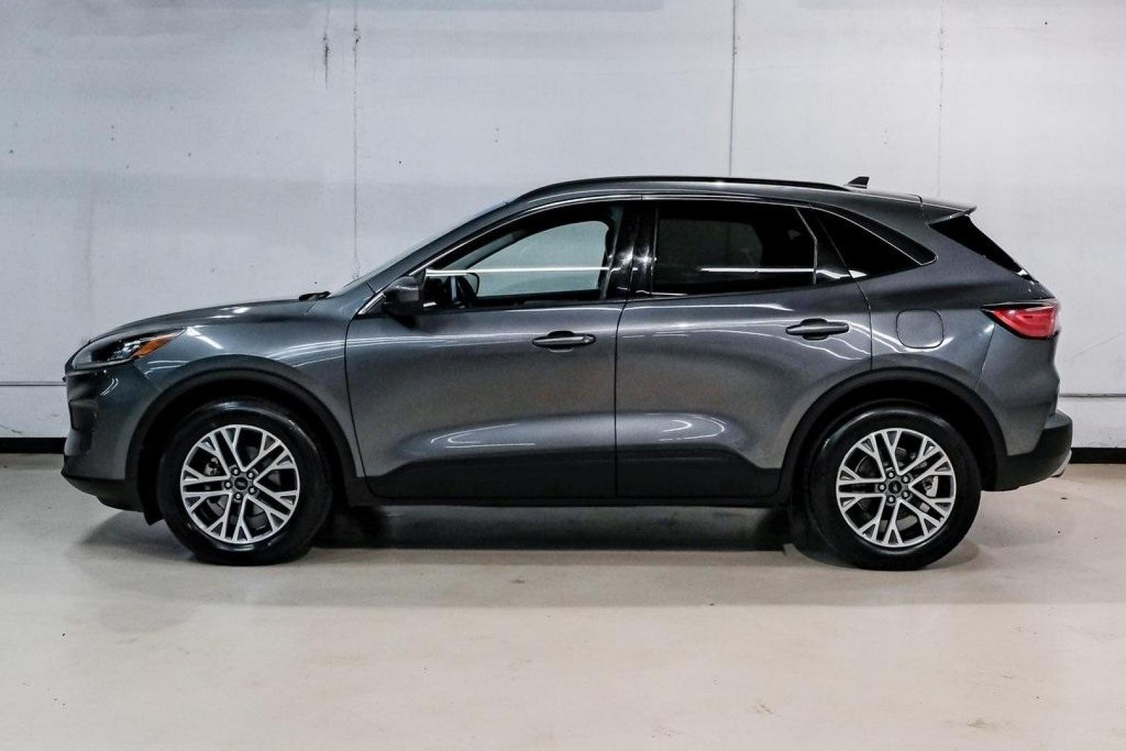 2021 Gray Metallic /Ebony Ford Escape SEL (1FMCU9H6XMU) with an 1.5L EcoBoost engine, Automatic transmission, located at 15300 Midway Rd., Addison, TX, 75001, (972) 702-0011, 32.958321, -96.838074 - Photo#15