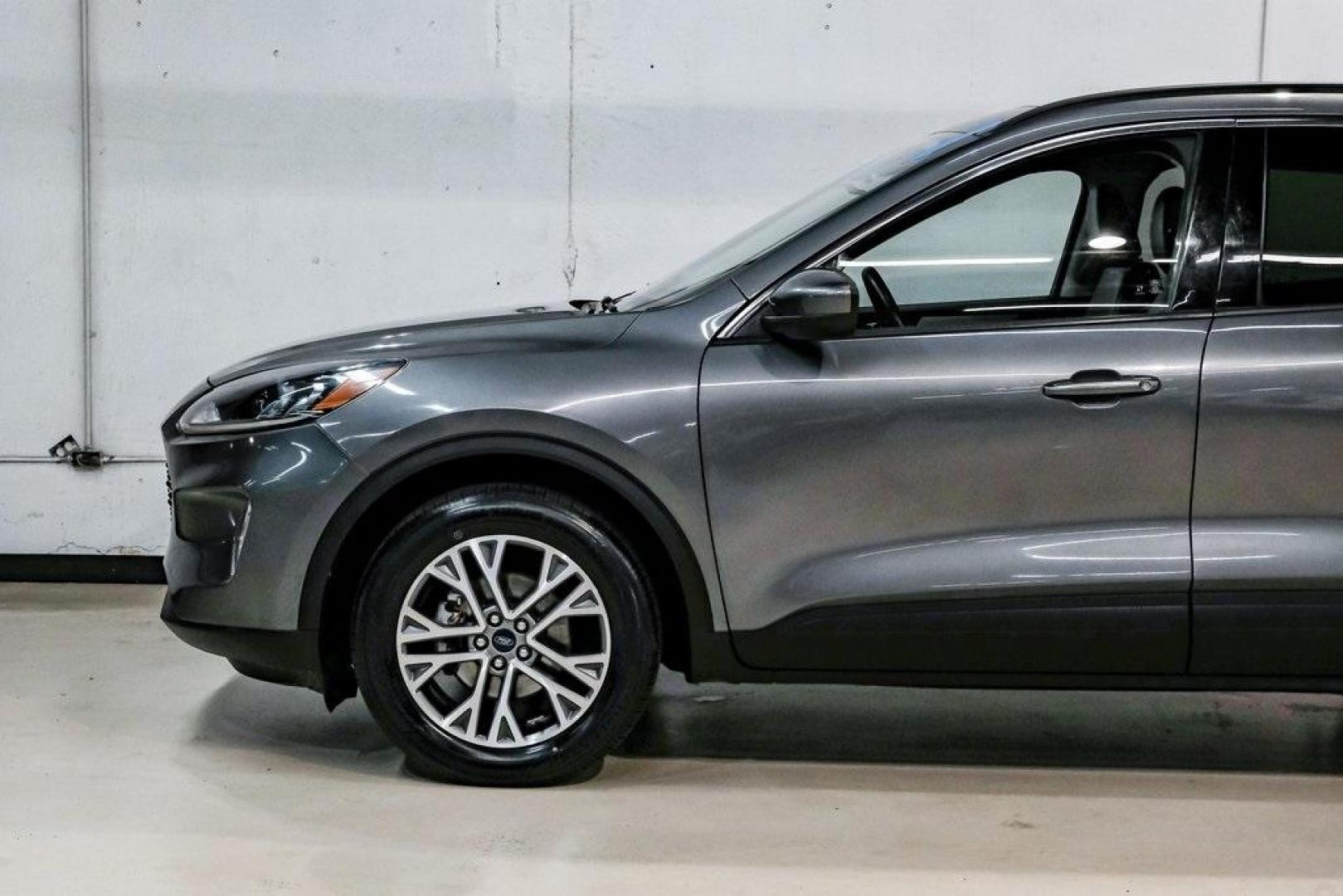 2021 Gray Metallic /Ebony Ford Escape SEL (1FMCU9H6XMU) with an 1.5L EcoBoost engine, Automatic transmission, located at 15300 Midway Rd., Addison, TX, 75001, (972) 702-0011, 32.958321, -96.838074 - Photo#16