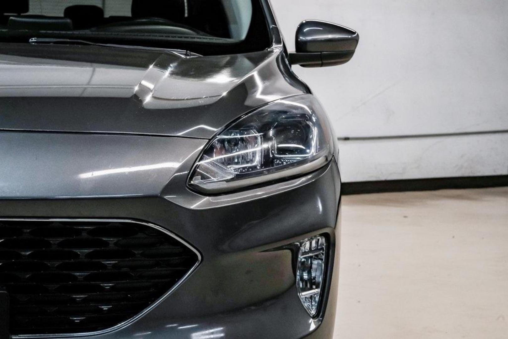 2021 Gray Metallic /Ebony Ford Escape SEL (1FMCU9H6XMU) with an 1.5L EcoBoost engine, Automatic transmission, located at 15300 Midway Rd., Addison, TX, 75001, (972) 702-0011, 32.958321, -96.838074 - Photo#54