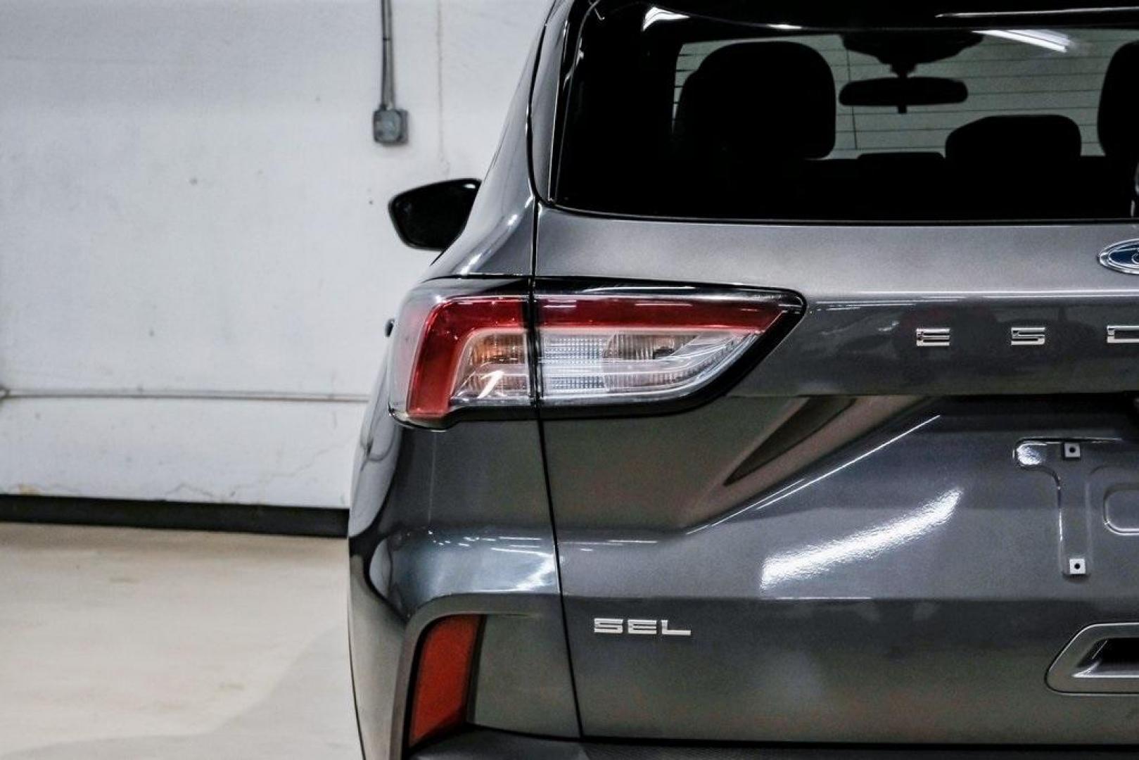 2021 Gray Metallic /Ebony Ford Escape SEL (1FMCU9H6XMU) with an 1.5L EcoBoost engine, Automatic transmission, located at 15300 Midway Rd., Addison, TX, 75001, (972) 702-0011, 32.958321, -96.838074 - Photo#55