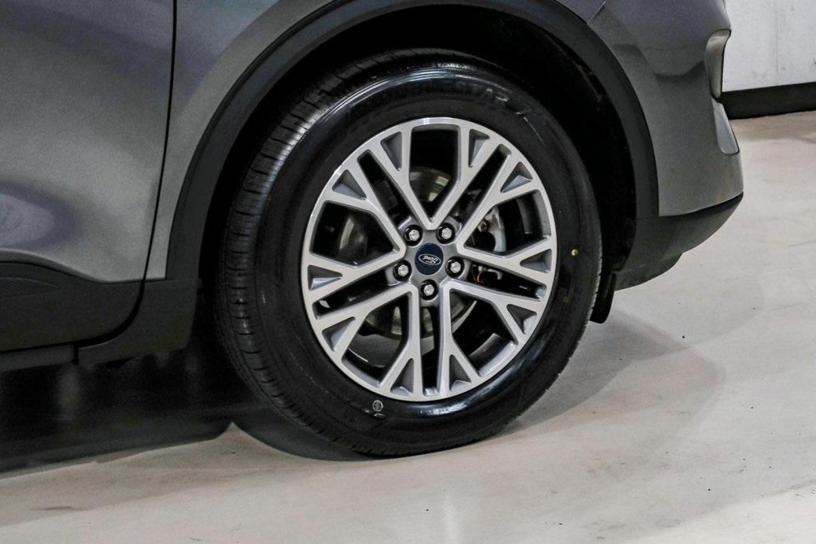 2021 Gray Metallic /Ebony Ford Escape SEL (1FMCU9H6XMU) with an 1.5L EcoBoost engine, Automatic transmission, located at 15300 Midway Rd., Addison, TX, 75001, (972) 702-0011, 32.958321, -96.838074 - Photo#65